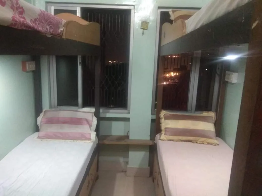 Bed in Shiva Guest House