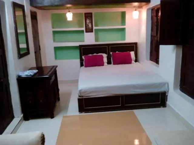 Photo of the whole room, Bed in Shiva Guest House