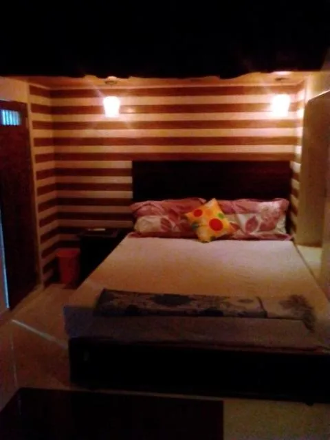 Photo of the whole room, Bed in Shiva Guest House