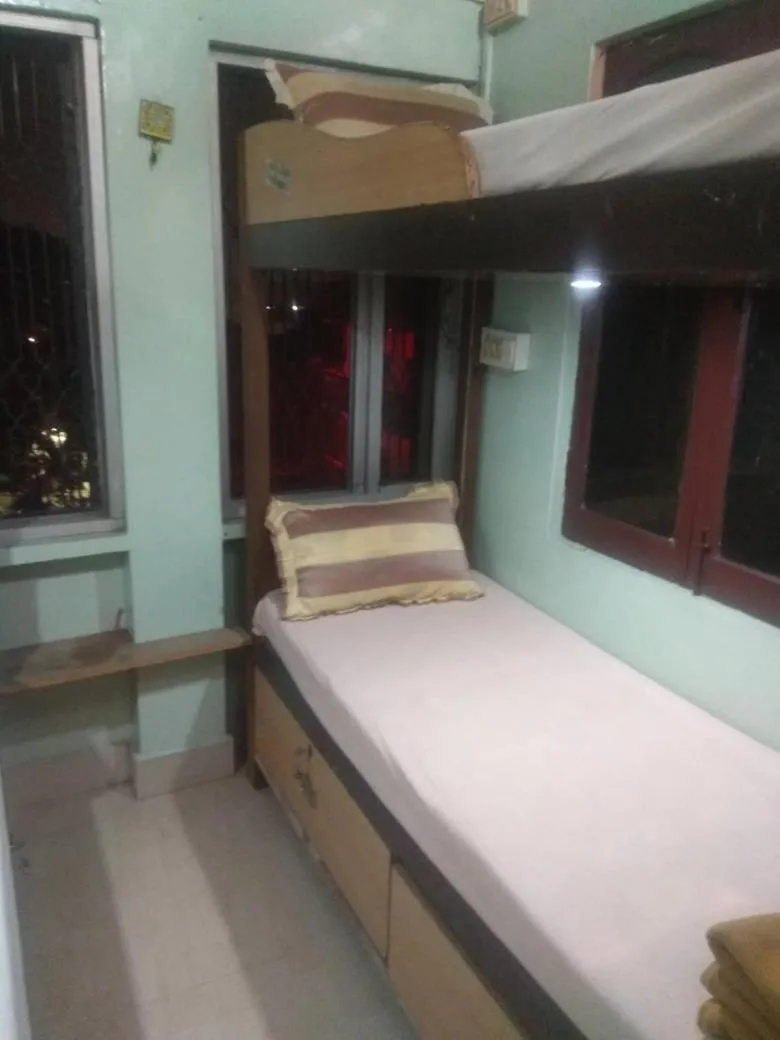 Bed in Shiva Guest House