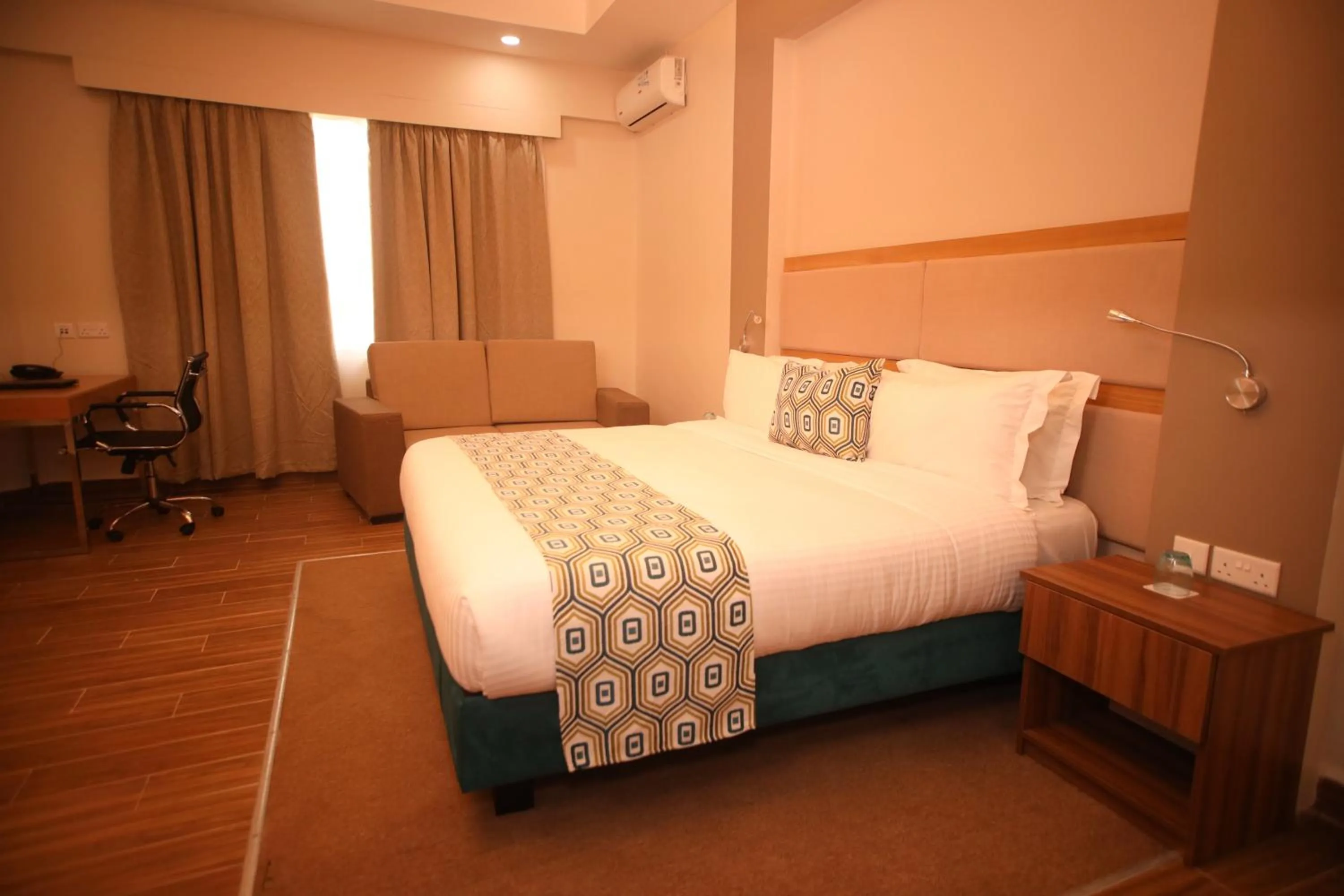 Bed in PrideInn Plaza Nairobi Airport