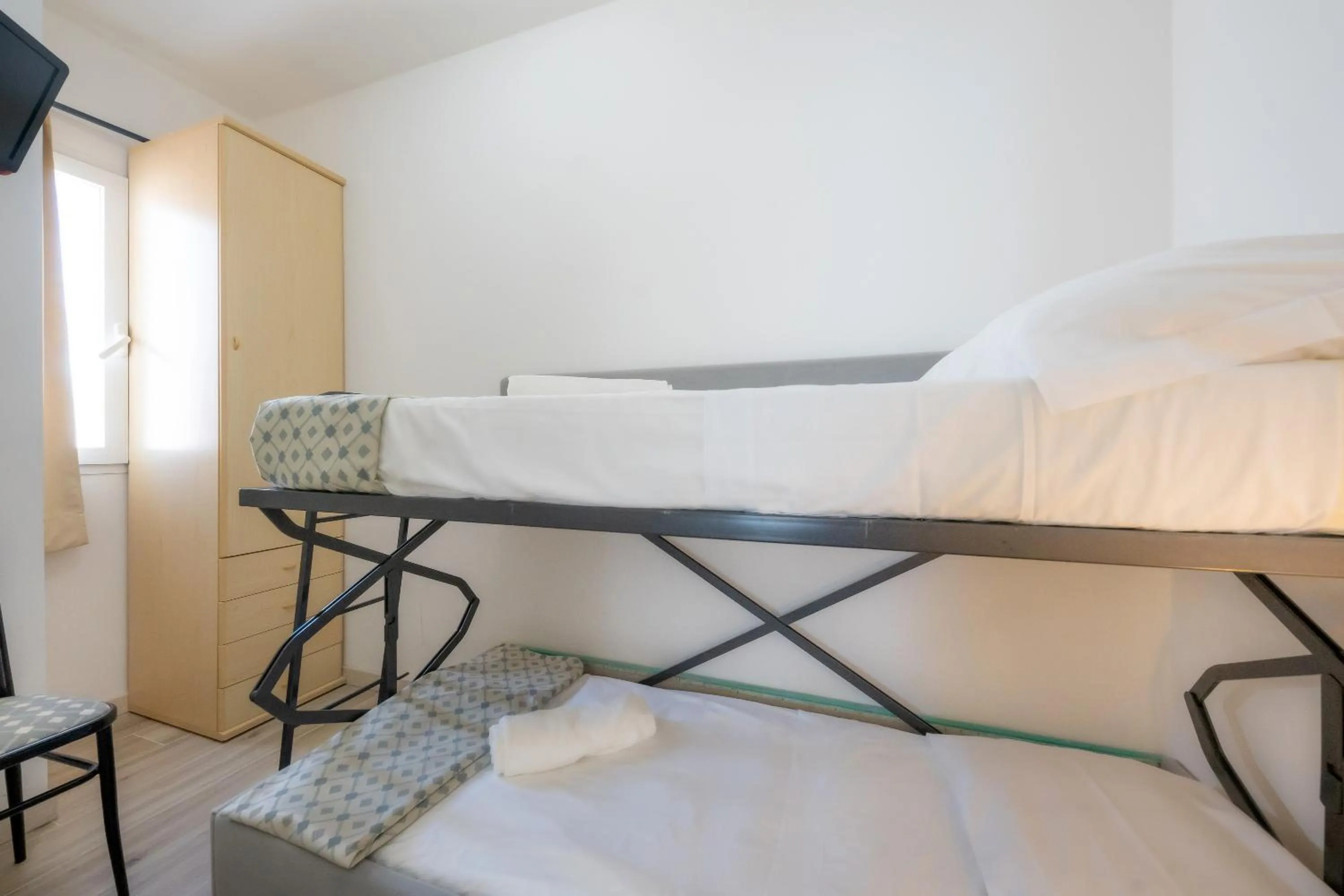 Bedroom in Hotel Tizian Beach