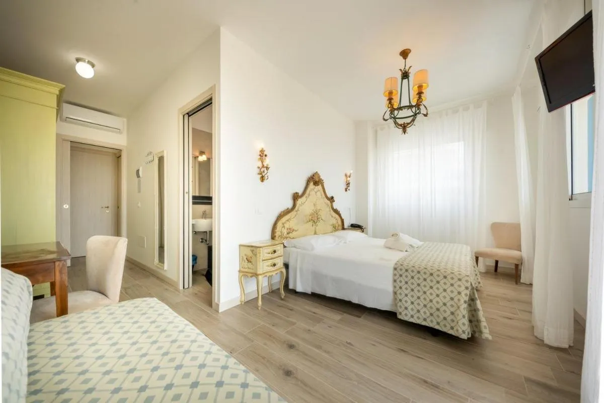 Bed in Hotel Tizian Beach