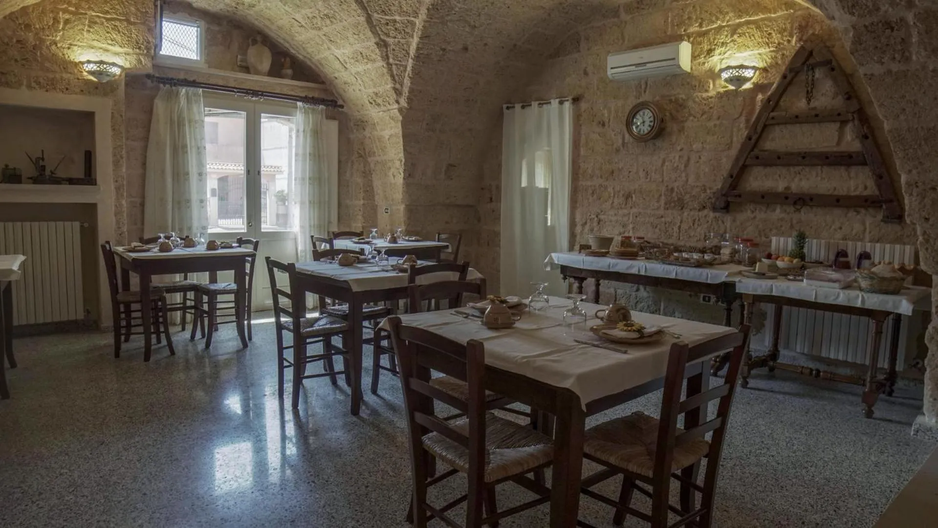 Communal lounge/ TV room in B&B La vecchia Corte