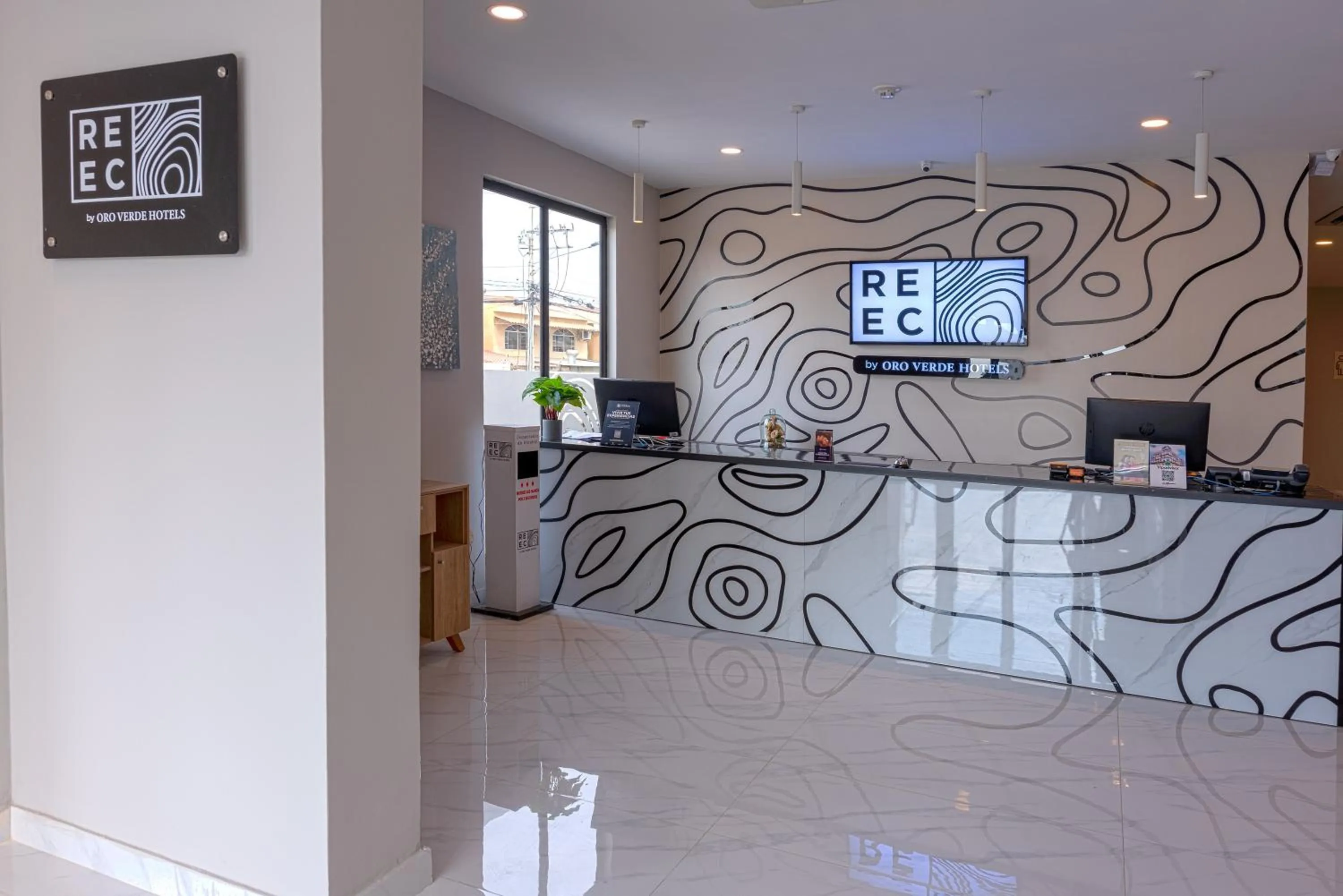 Lobby or reception in REEC Machala by Oro Verde Hotels