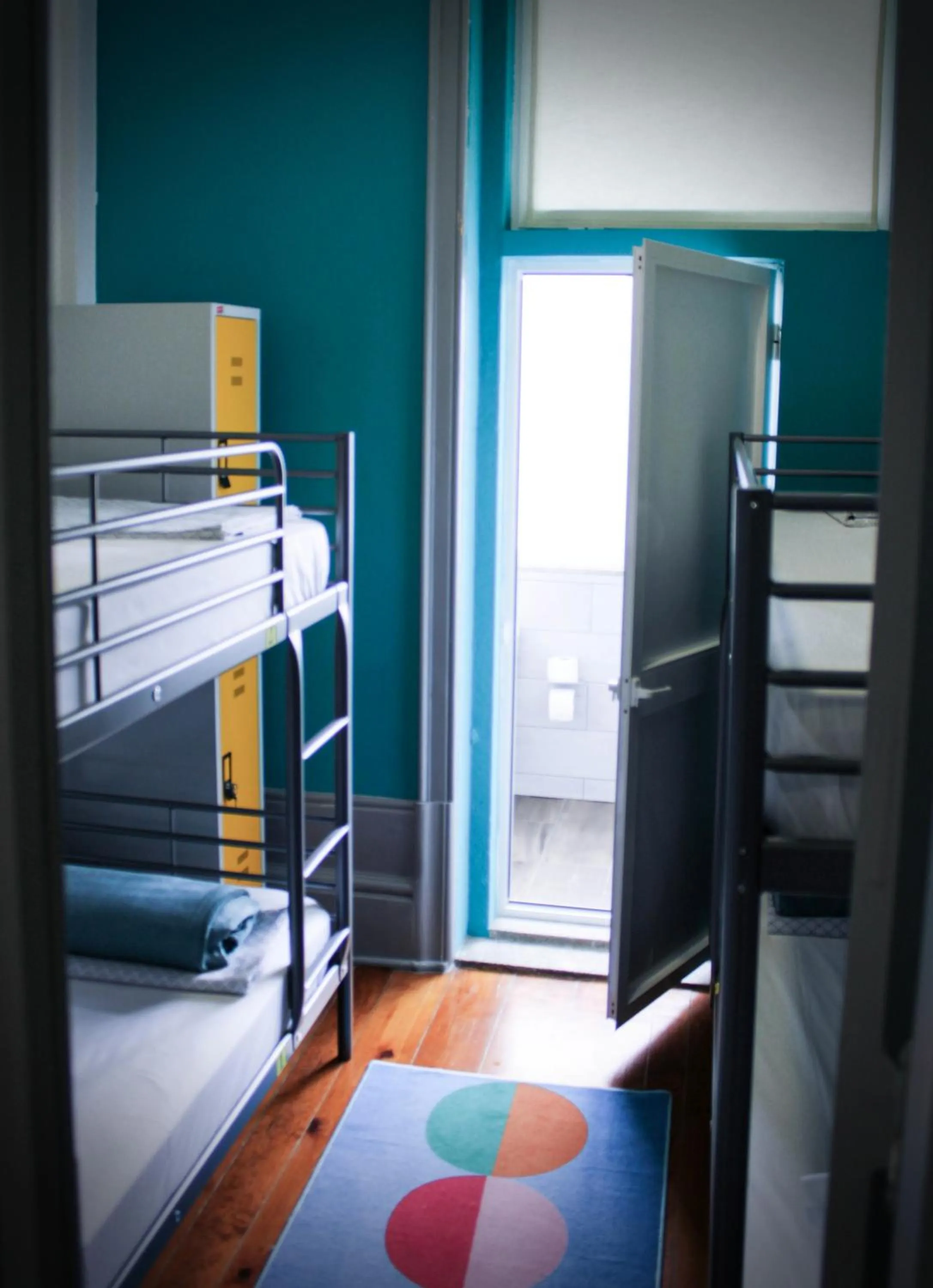 Shower, Bed in By Doors Hostel