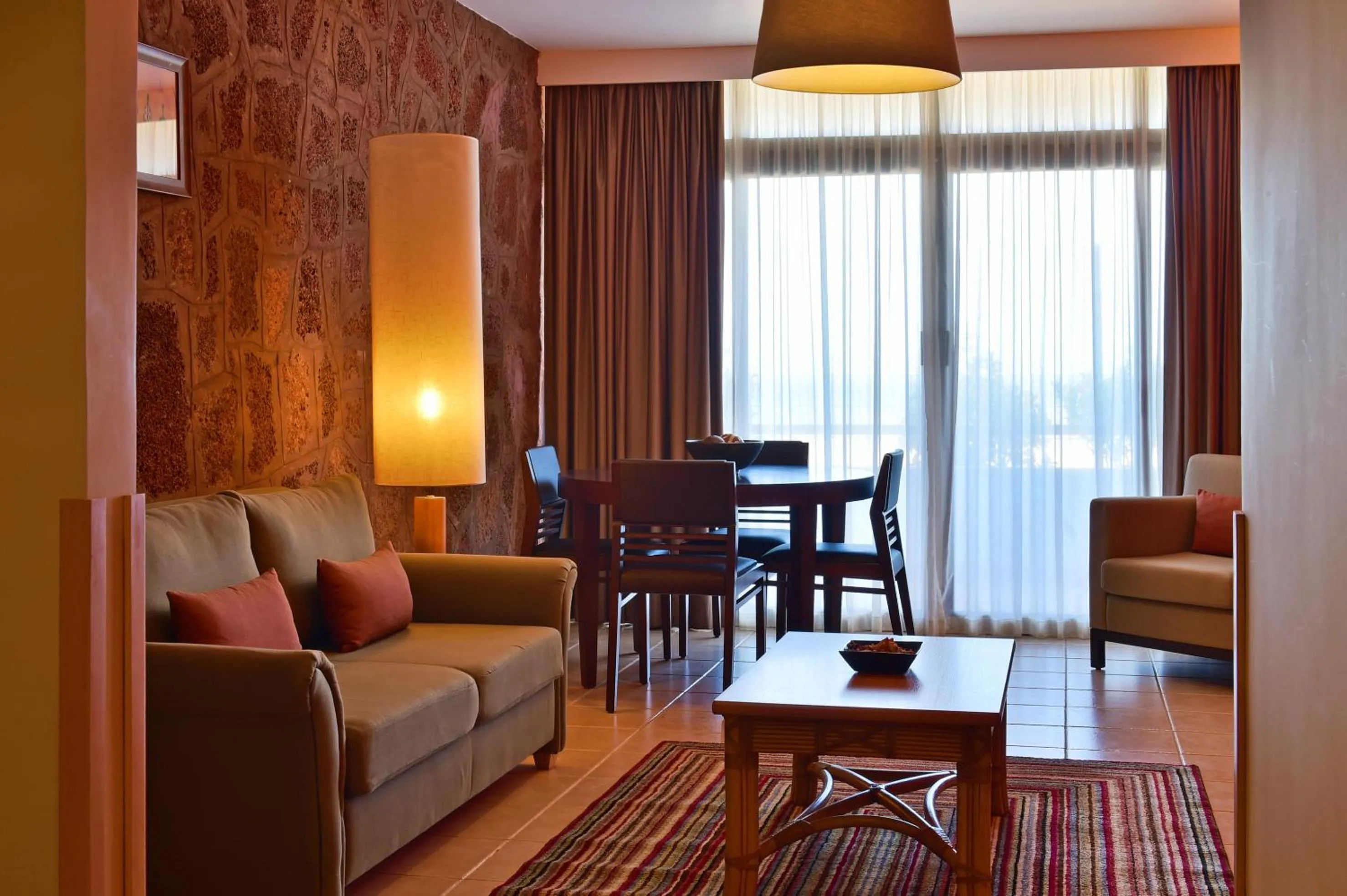 Living room in Pestana Tropico Ocean & City Hotel