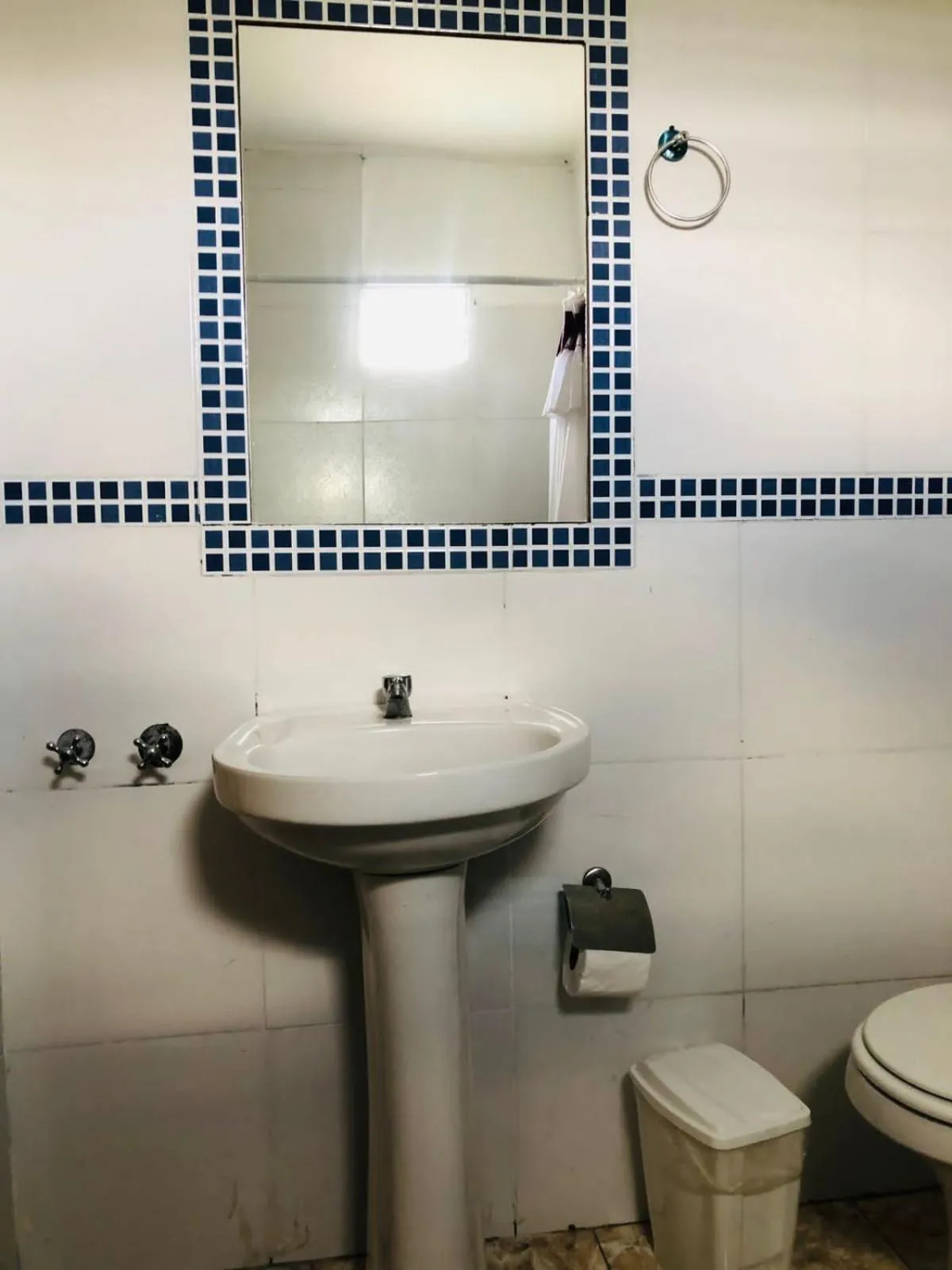 Toilet in La Familia Hotel