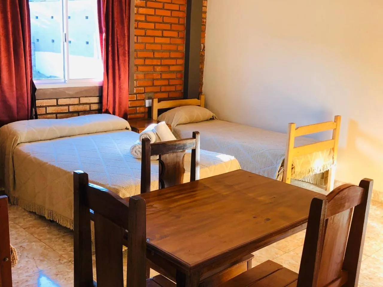 Bed in La Familia Hotel