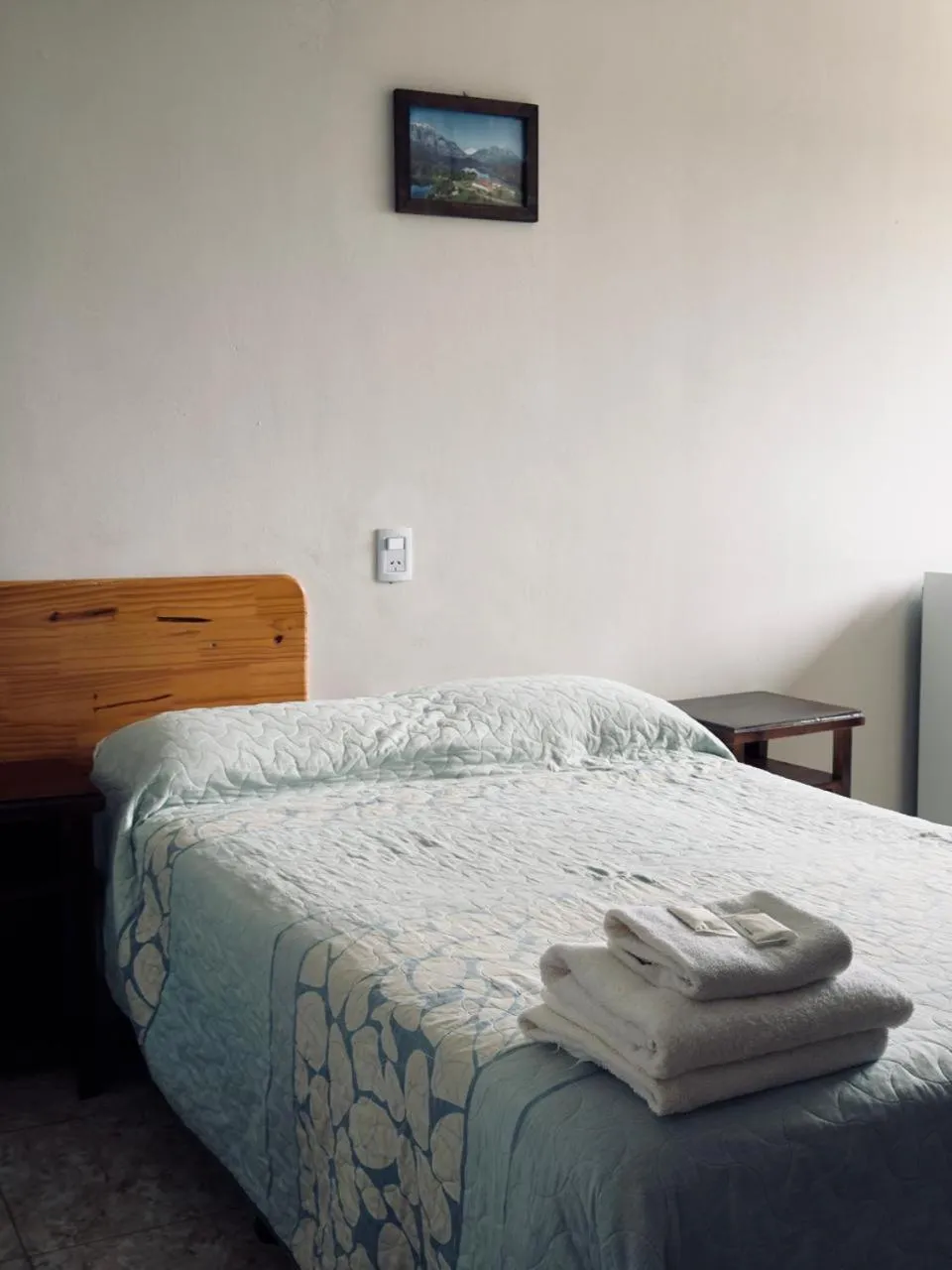 Bed in La Familia Hotel