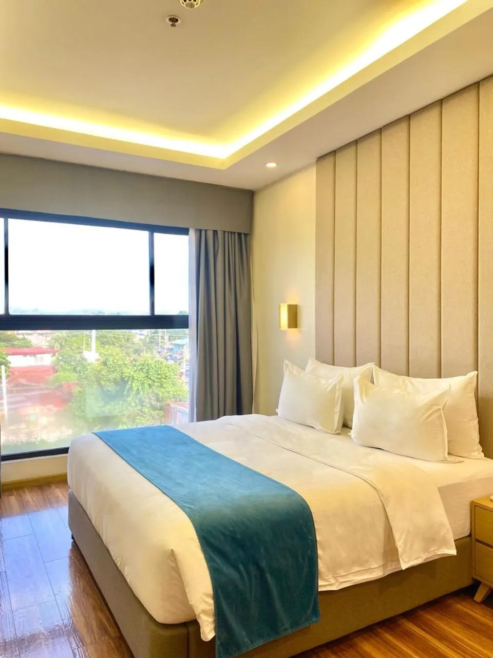 Bed in Bravo Tanauan Hotel