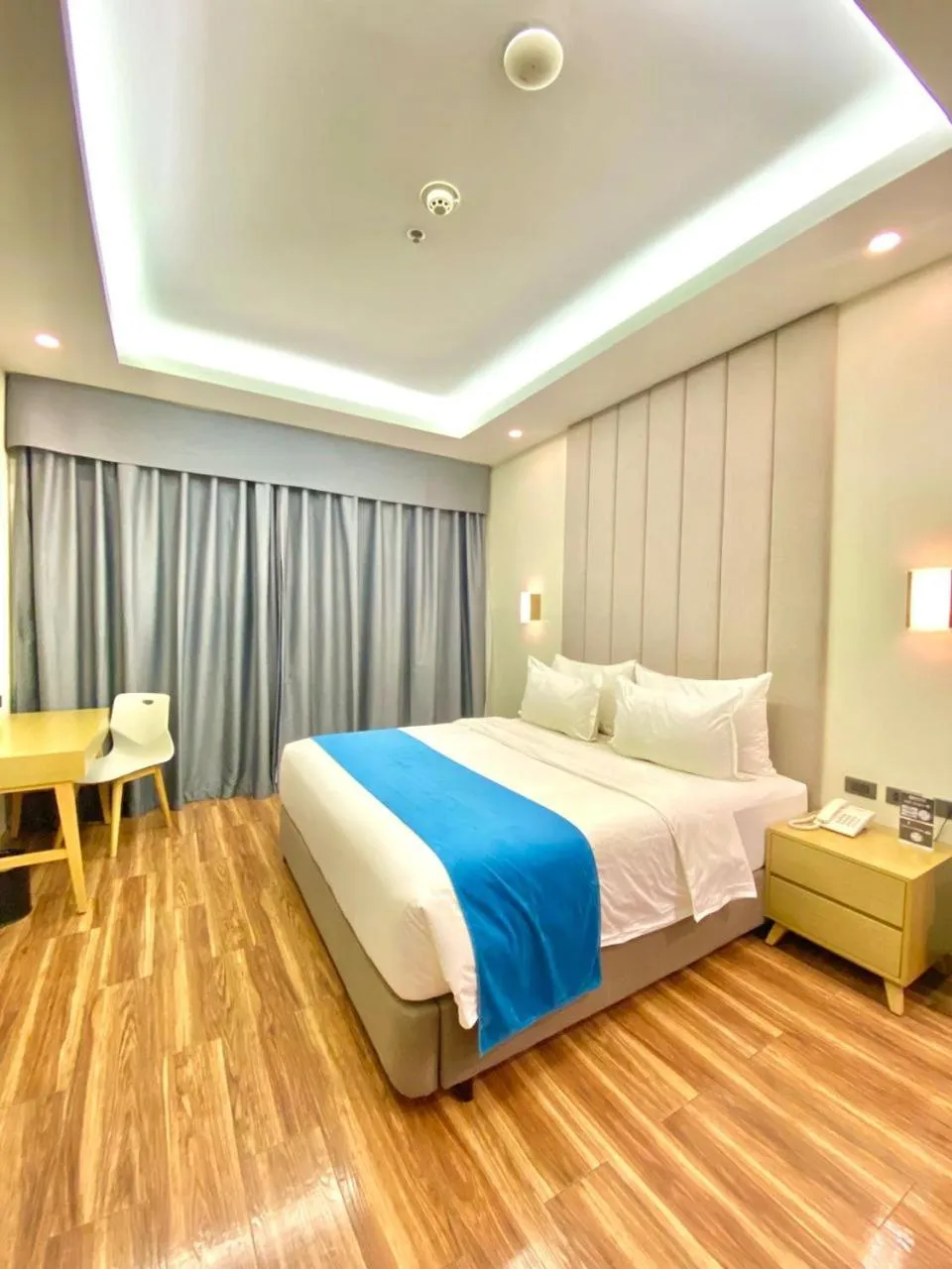 Bed in Bravo Tanauan Hotel