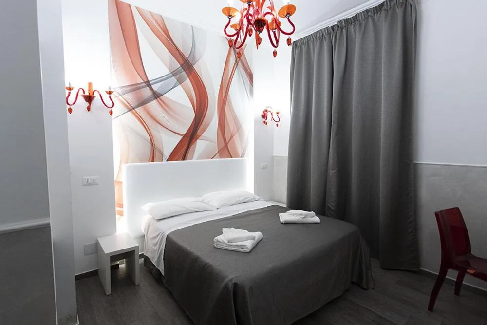 Bed in Rubino Guest House