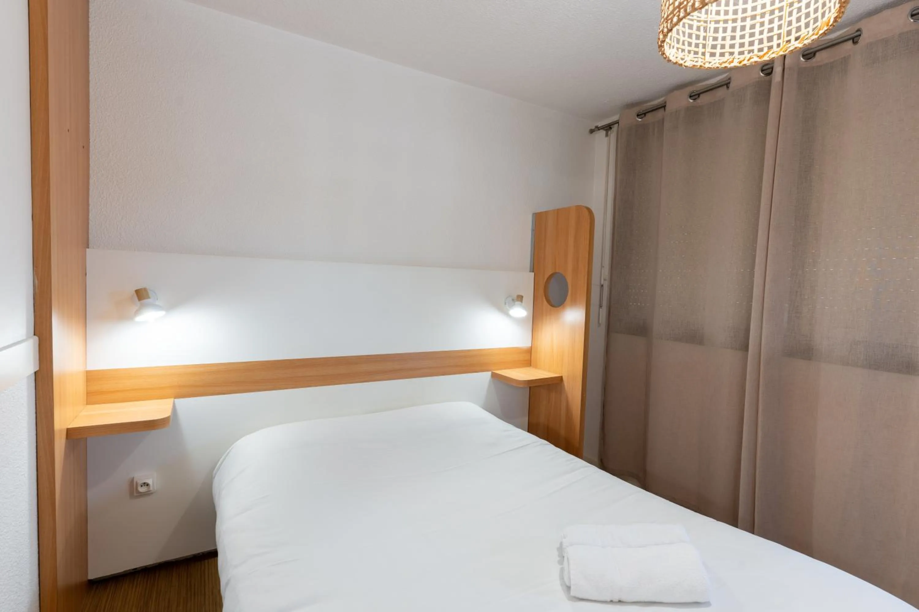 Bed in Kyriad Direct Bordeaux Sud Cestas