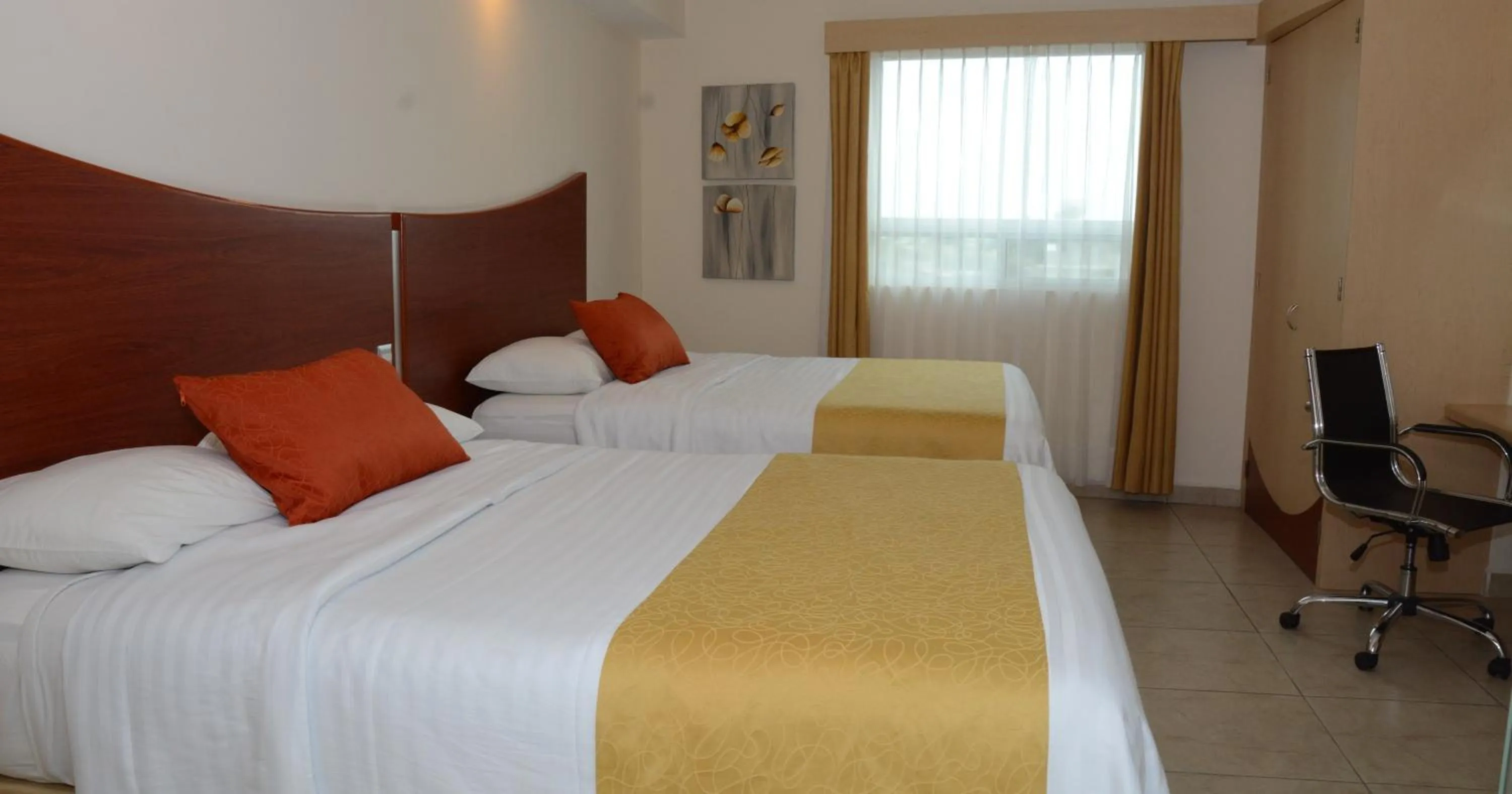 Bed in Hotel Magico Inn