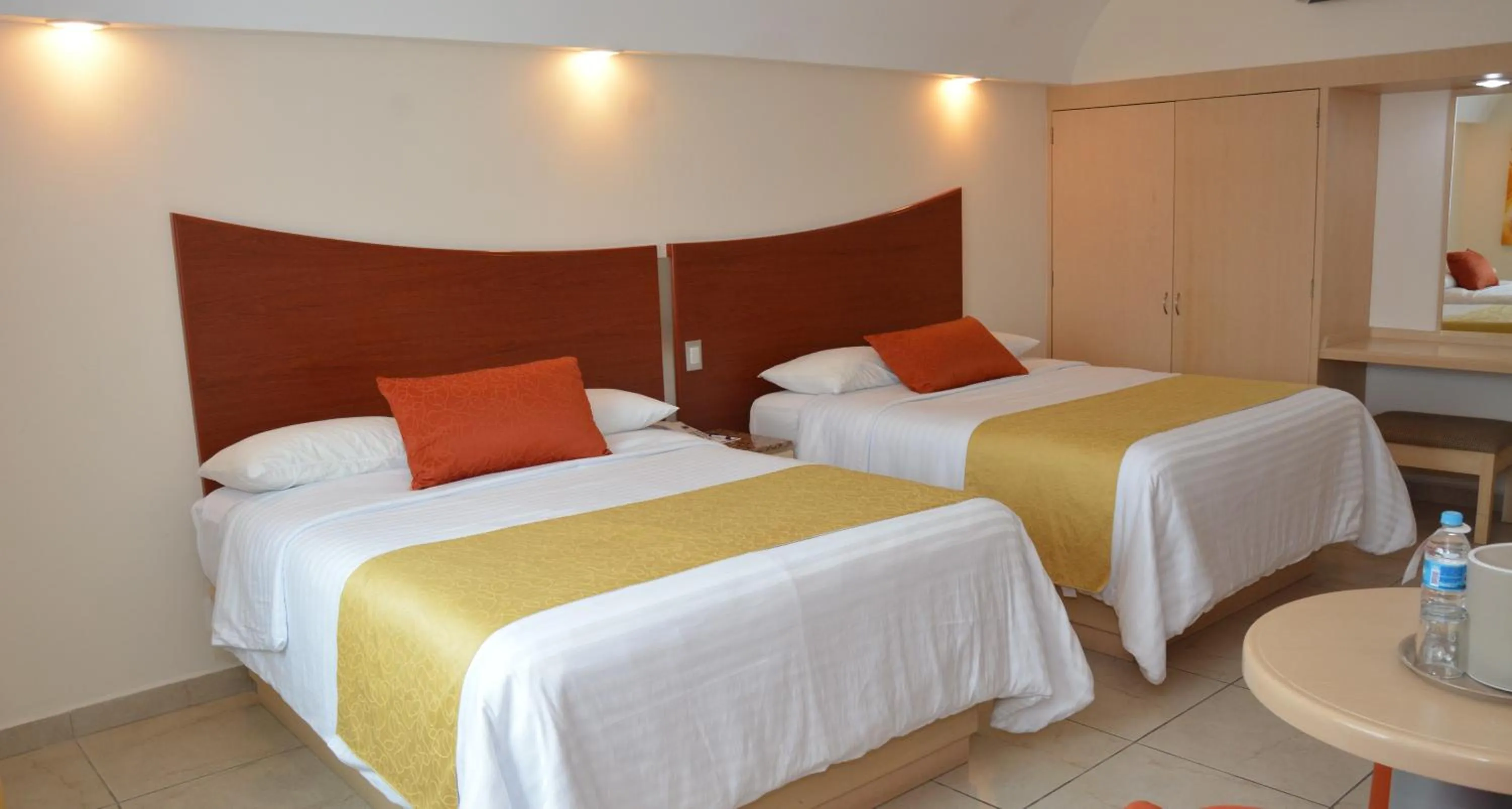 Bed in Hotel Magico Inn