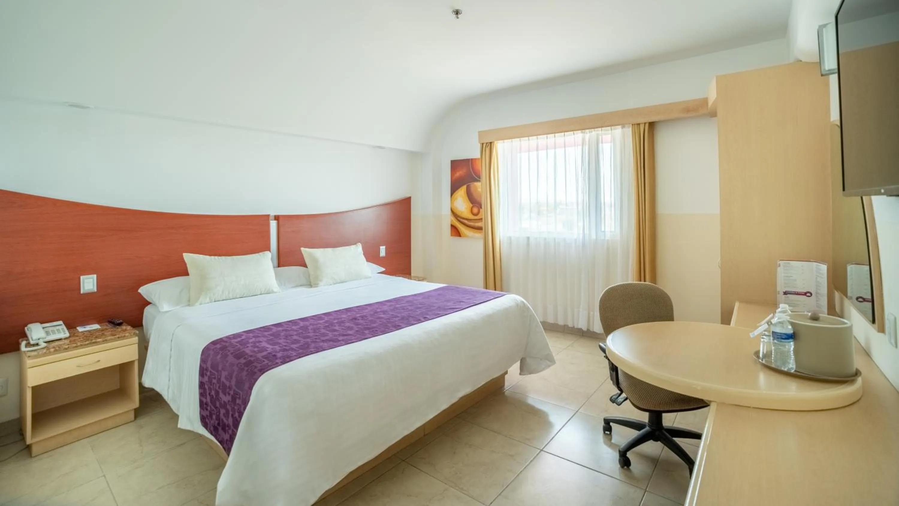 Bed in Hotel Magico Inn