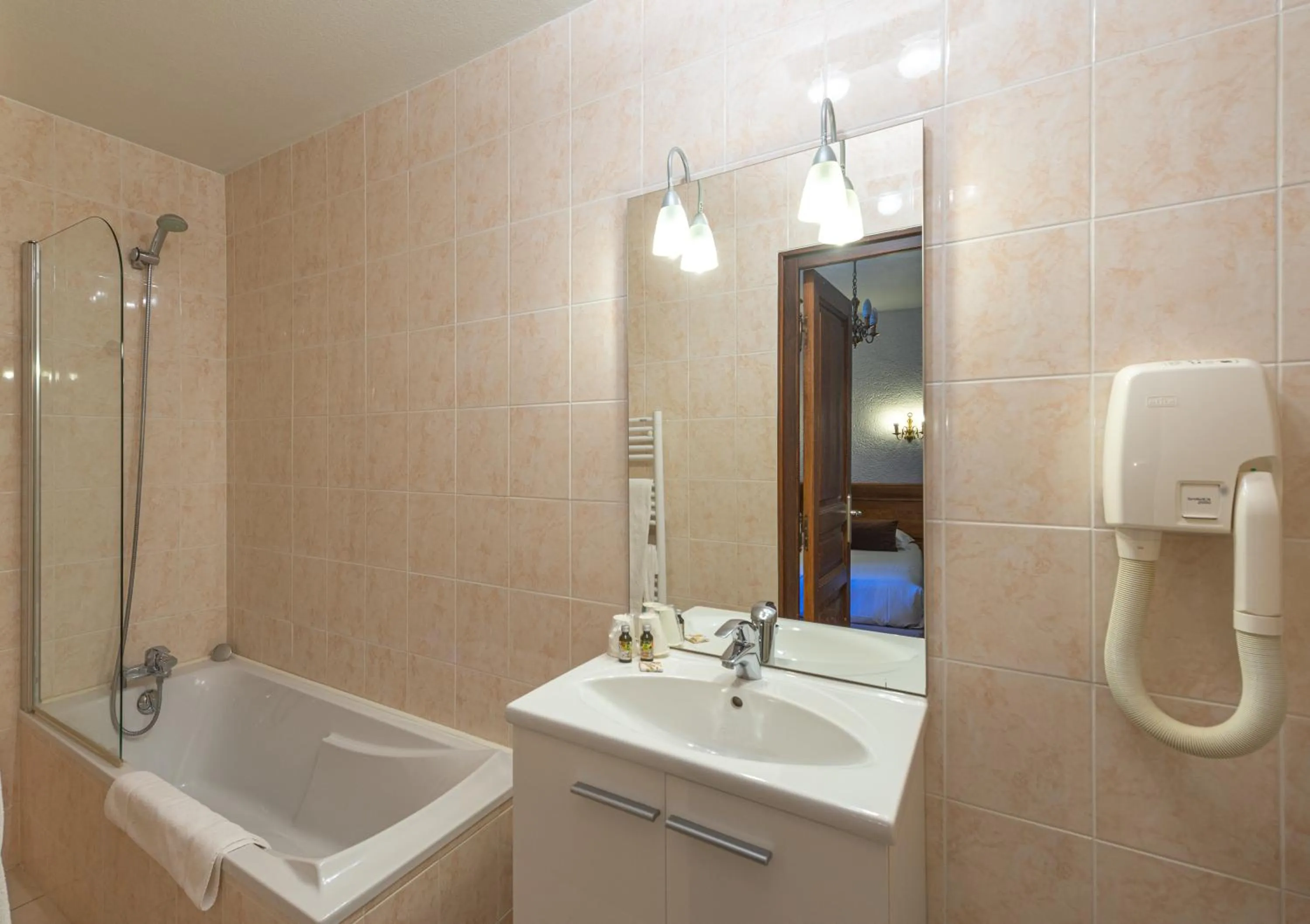 Bathroom in Logis Hotel de La Cloche