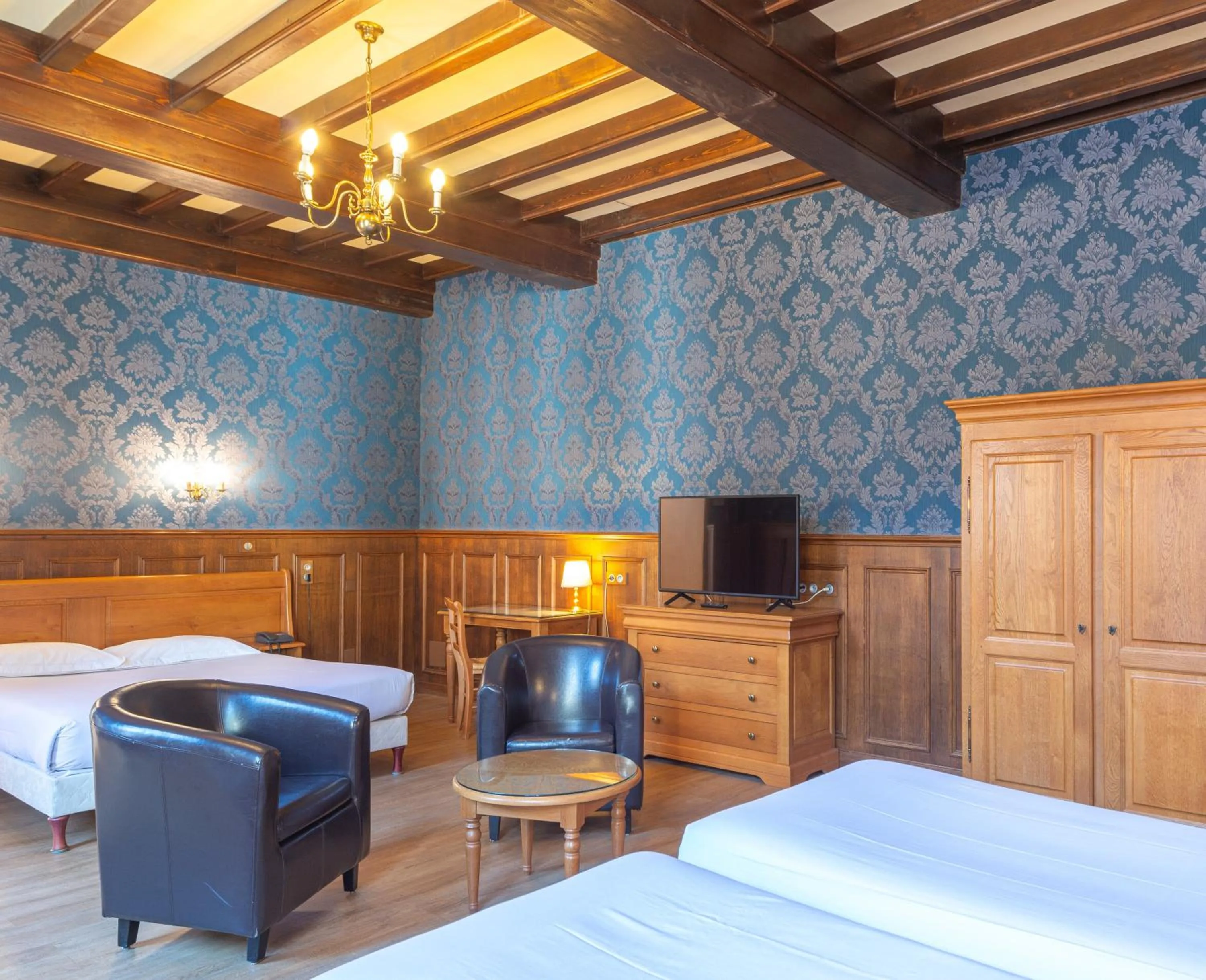 Photo of the whole room, Bed in Logis Hotel de La Cloche