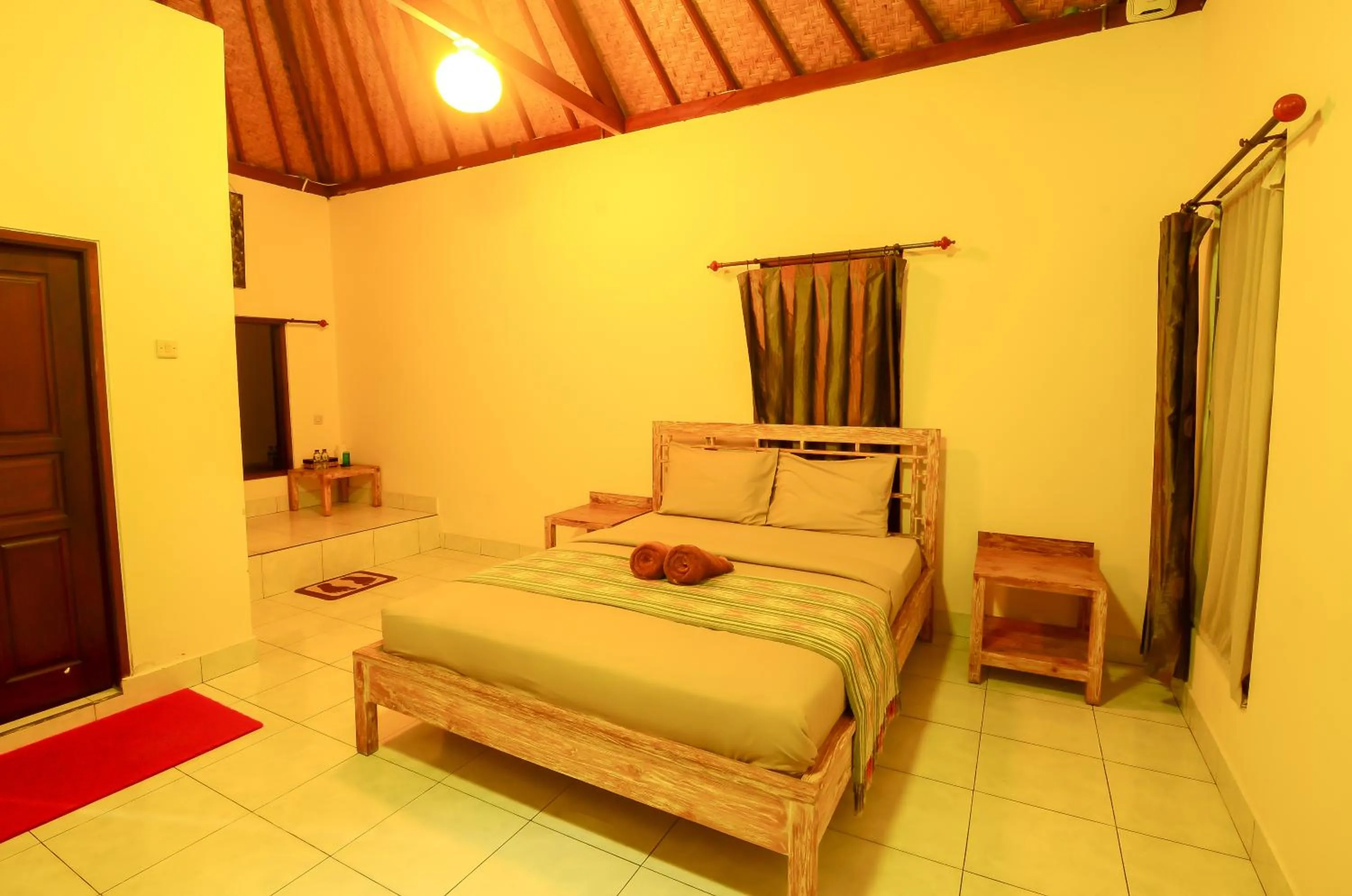 Bed in Mapa Lake View Bungalow