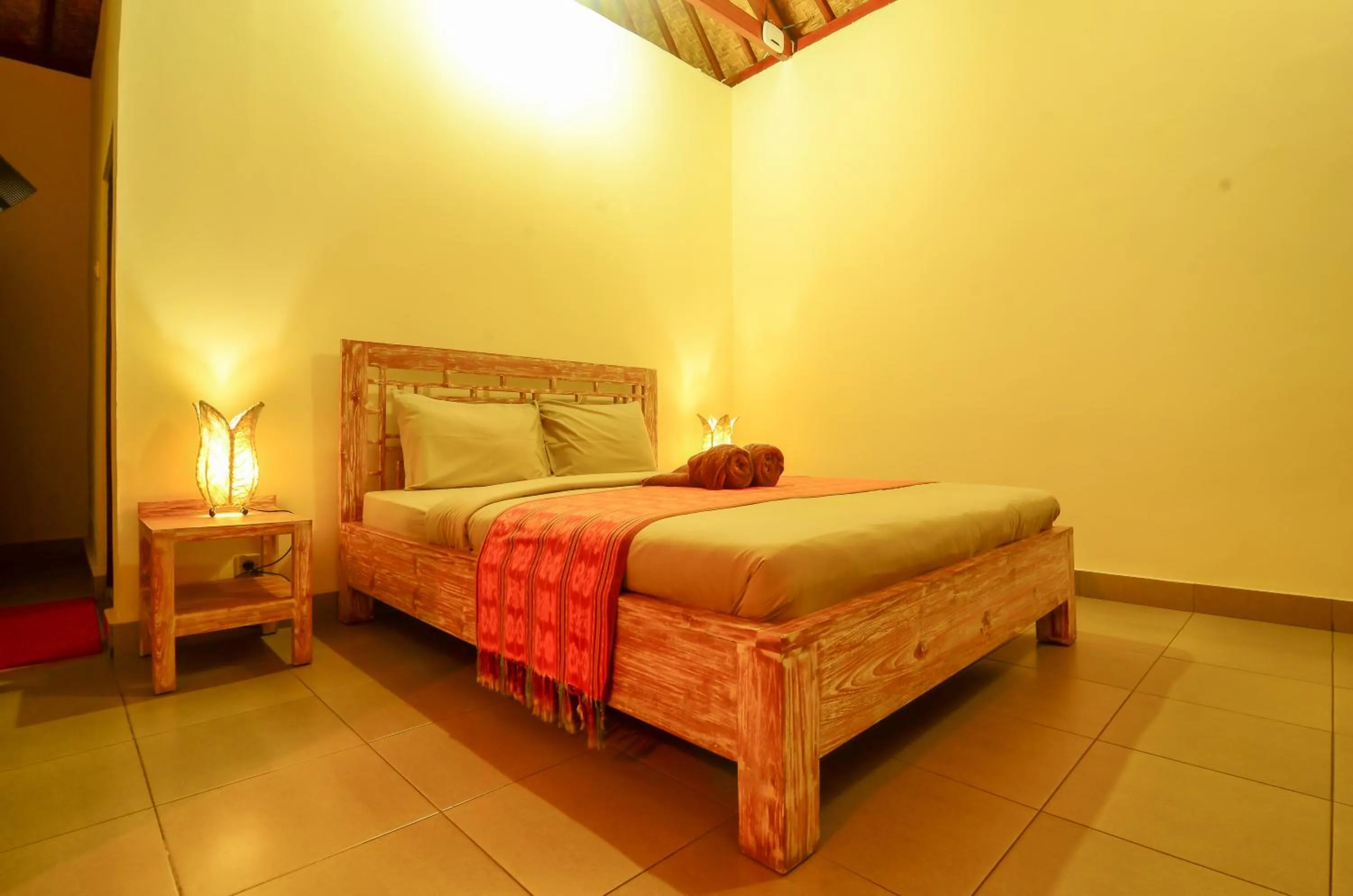 Bed in Mapa Lake View Bungalow