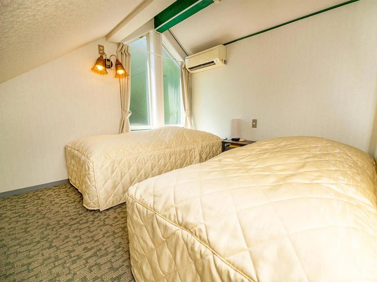 Bed in Hotel Cocorone Lodge and Spa
