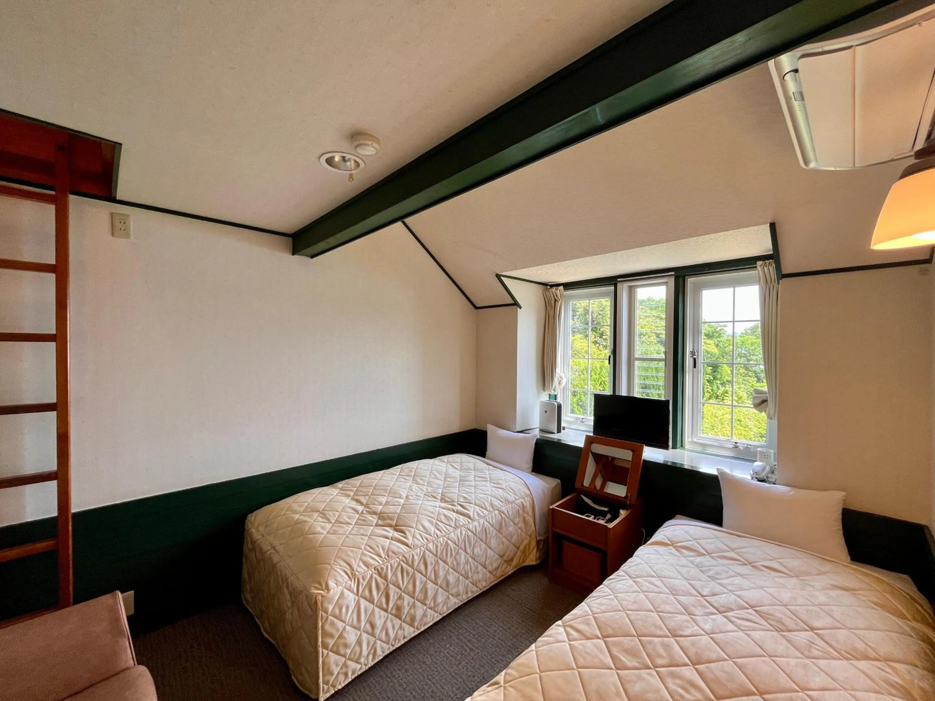 Bed in Hotel Cocorone Lodge and Spa