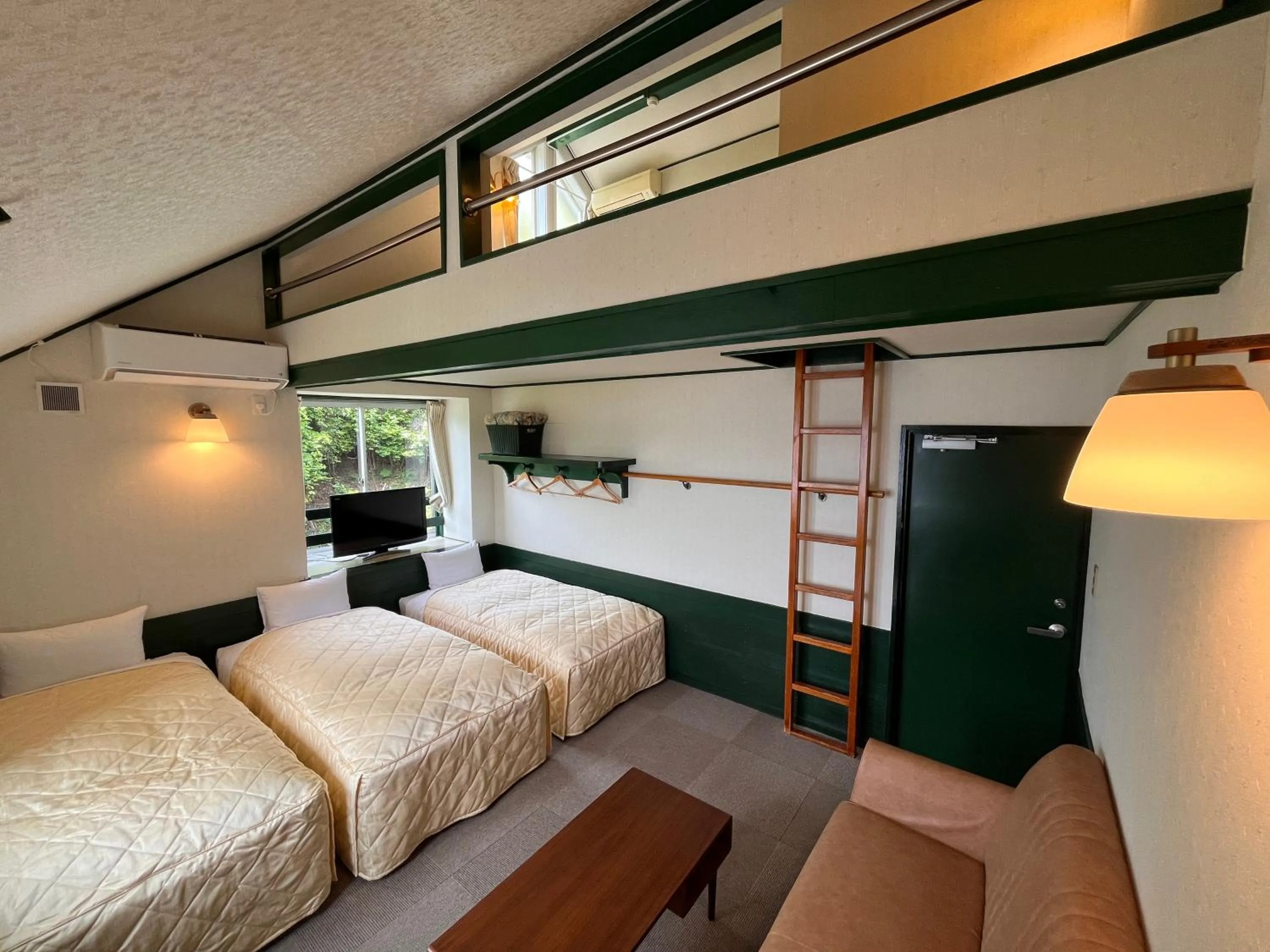 Bed in Hotel Cocorone Lodge and Spa