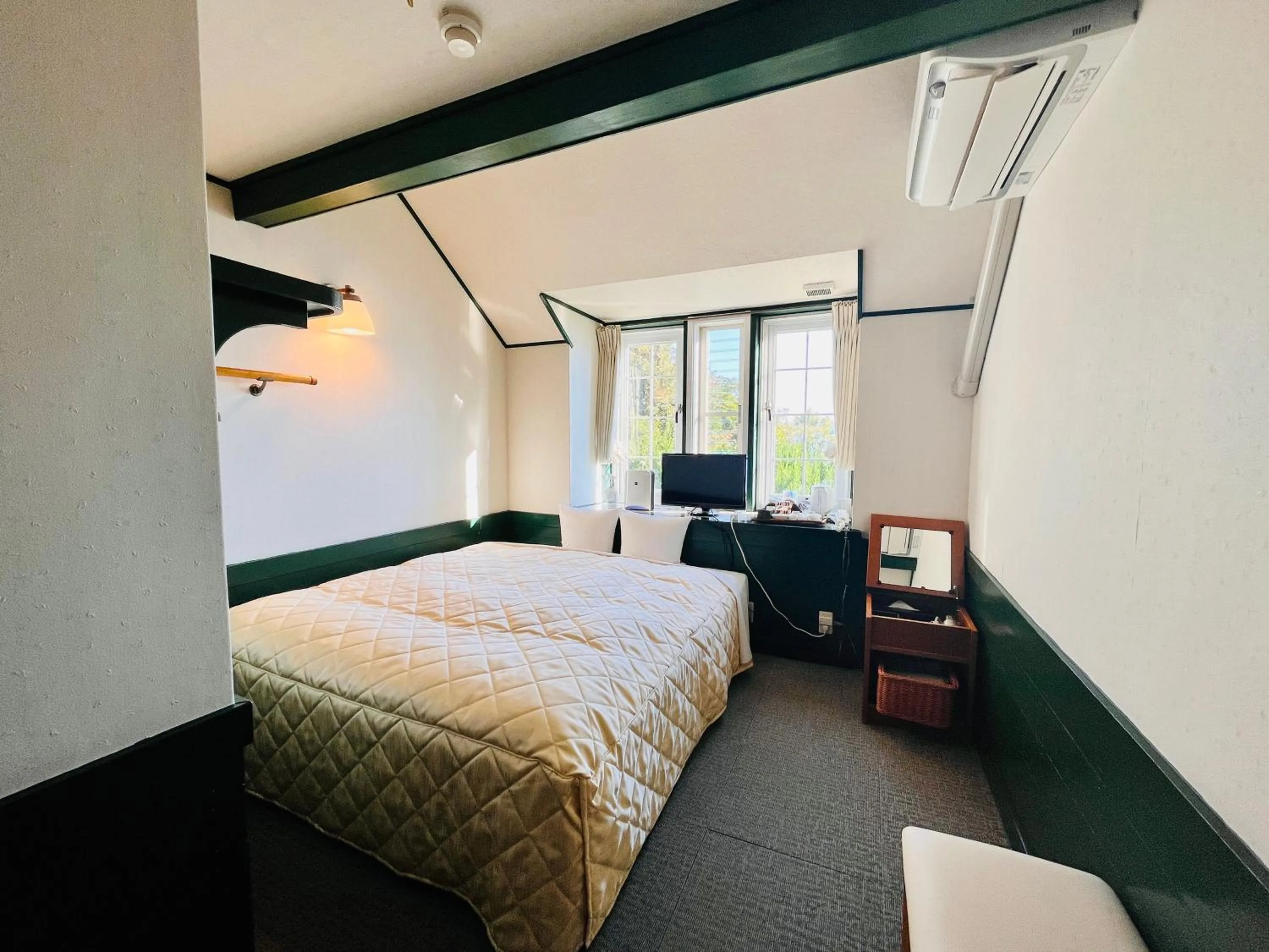 Bed in Hotel Cocorone Lodge and Spa