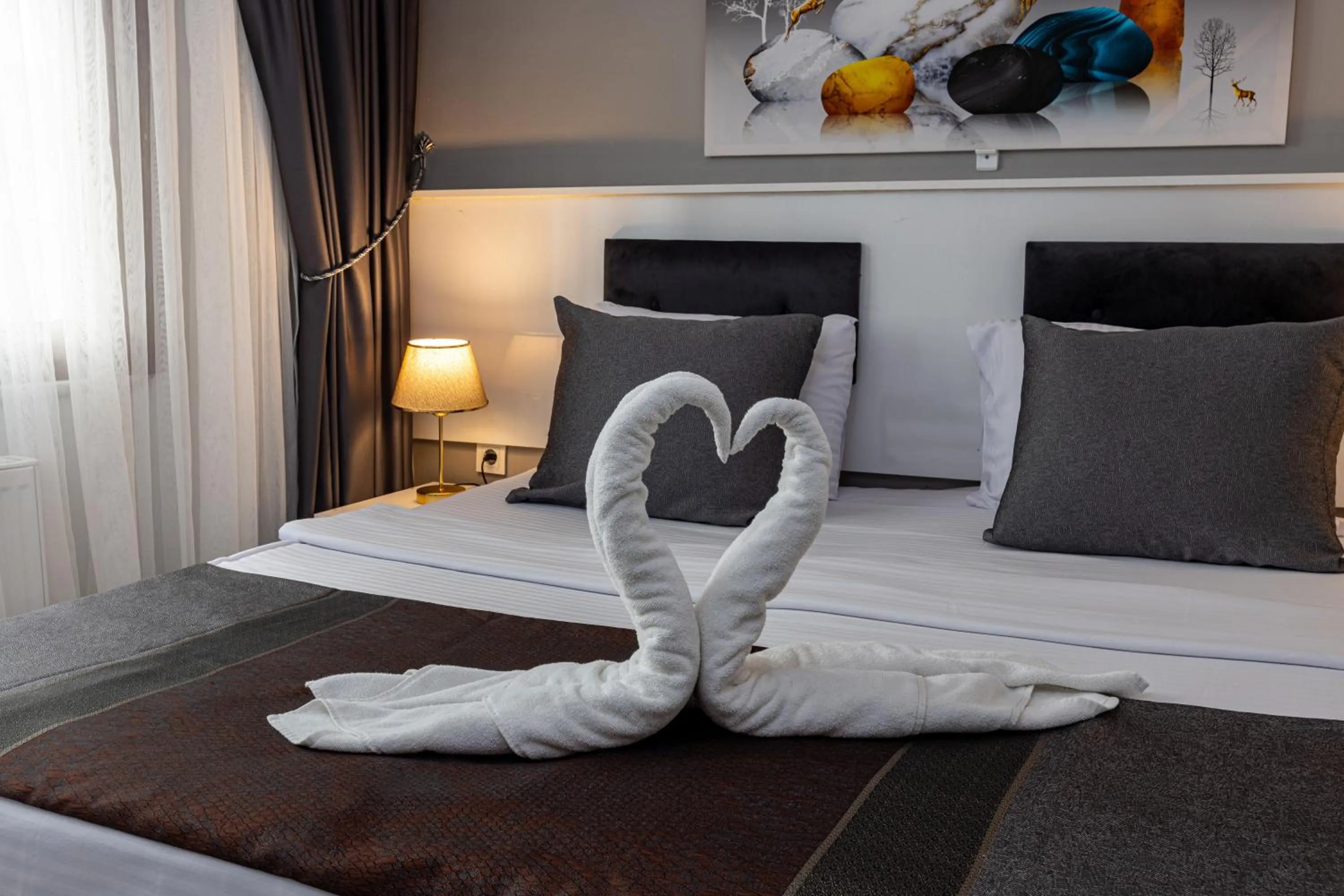 Bed in APOLLO HOTEL & APARTMENtS