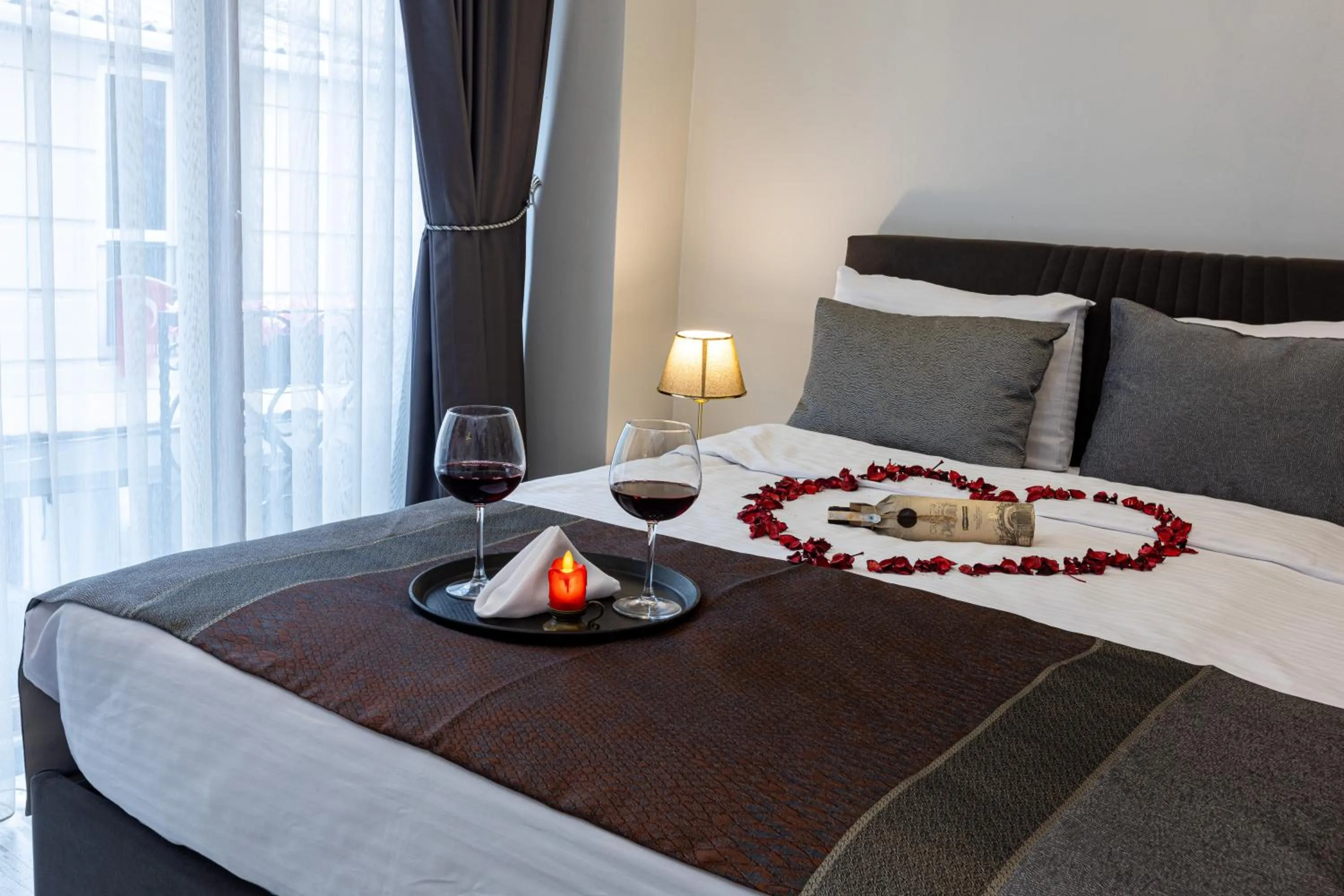 Bed in APOLLO HOTEL & APARTMENtS