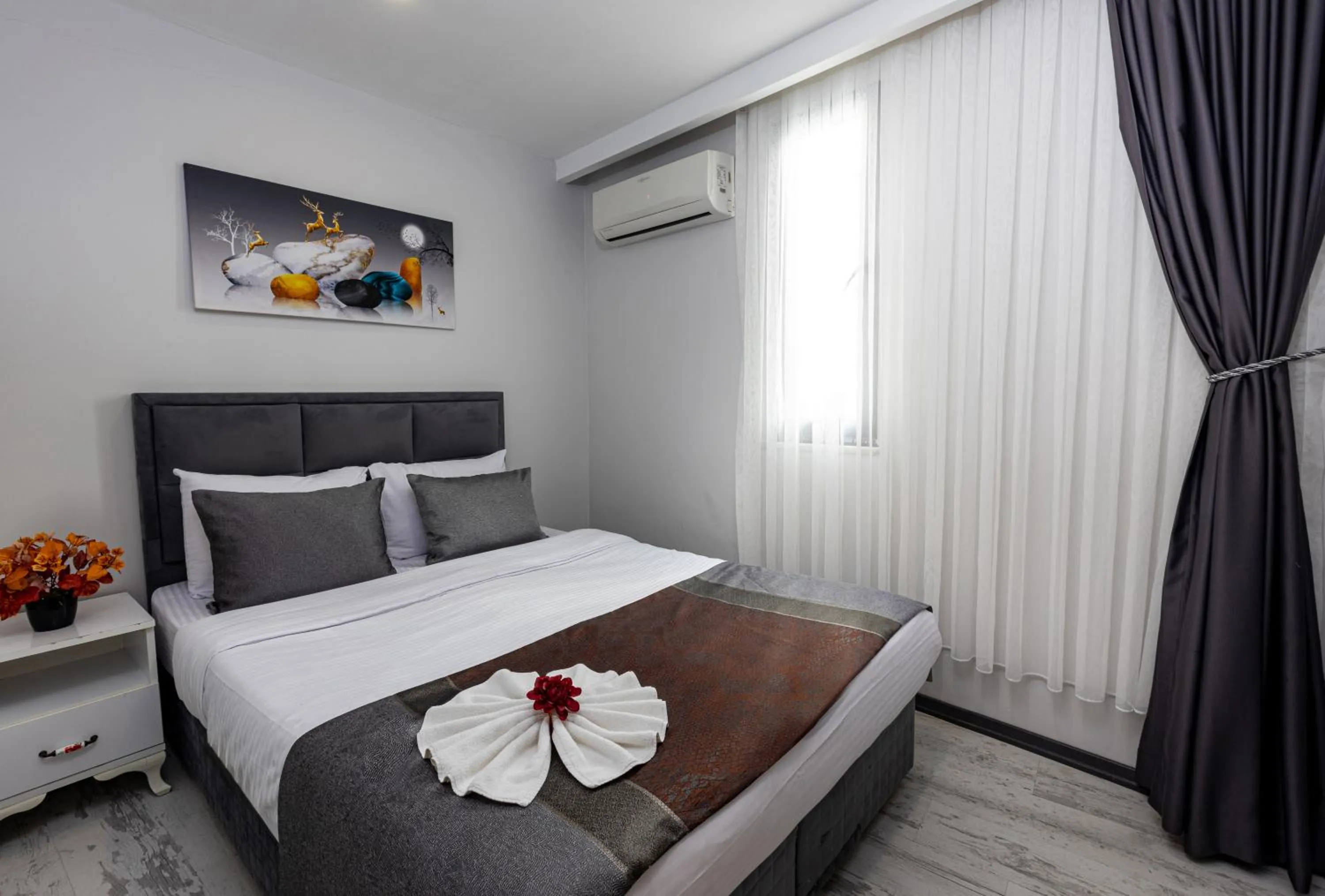 Bed in APOLLO HOTEL & APARTMENtS