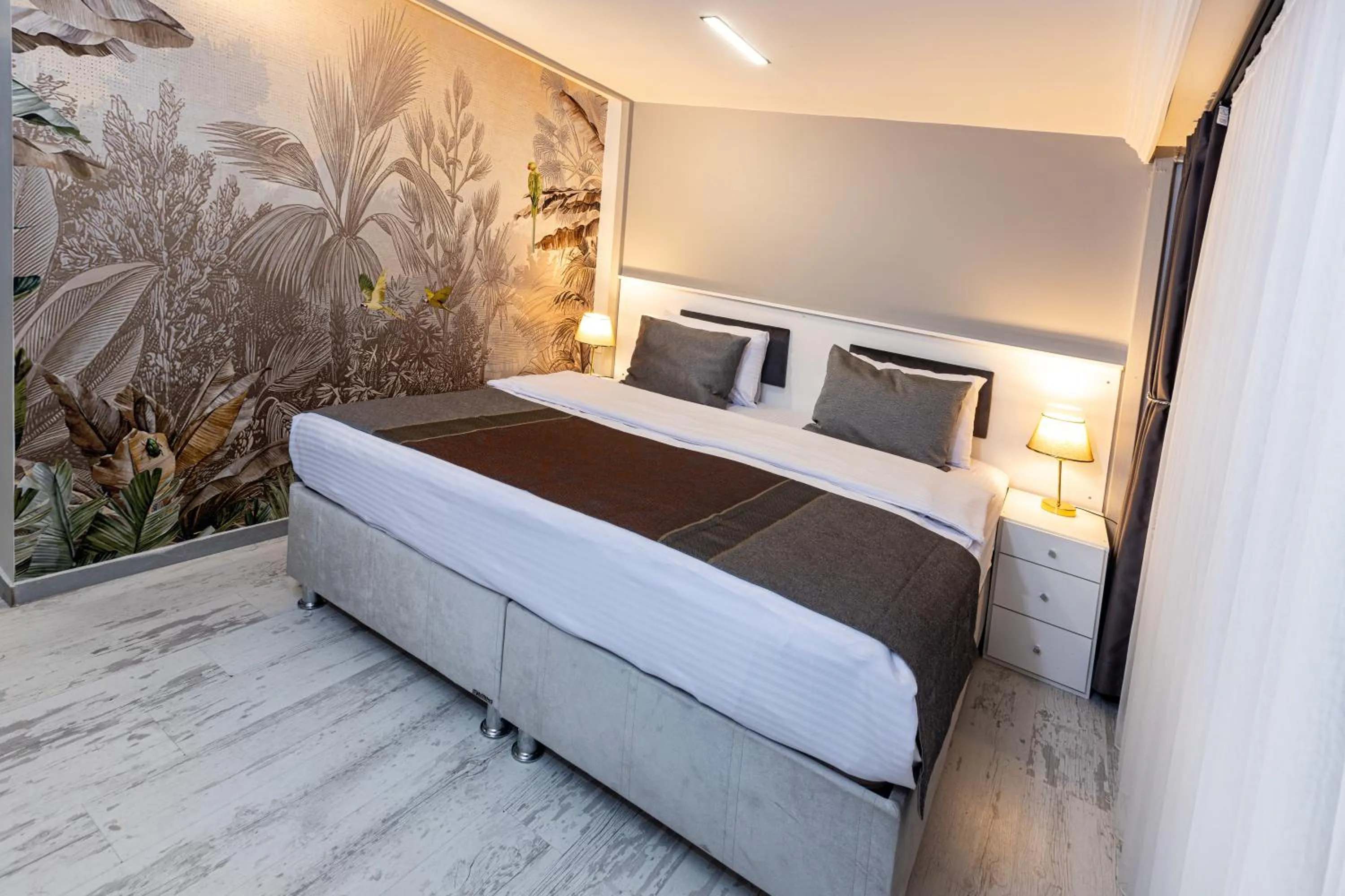 Bed in APOLLO HOTEL & APARTMENtS