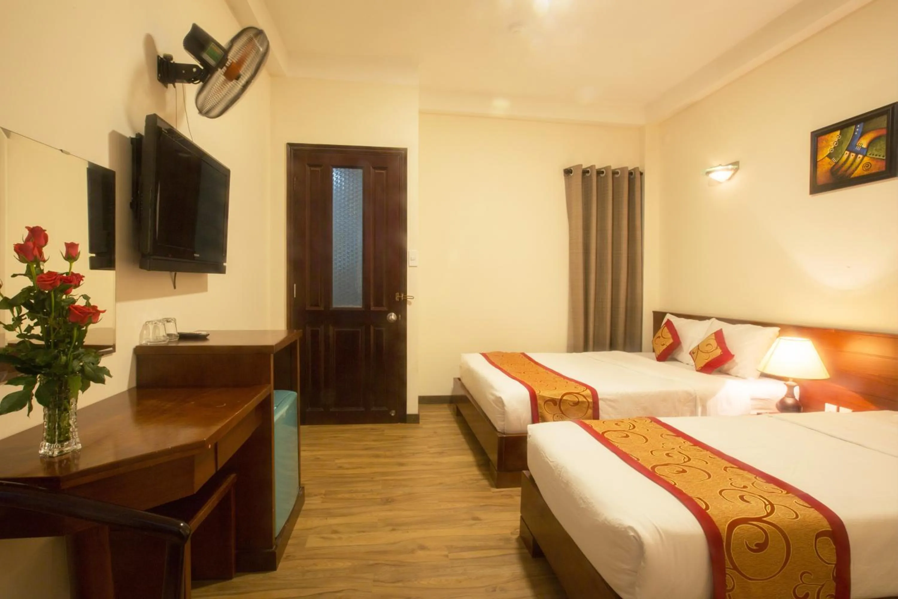 Communal lounge/ TV room, Bed in Ngoc Minh Hotel