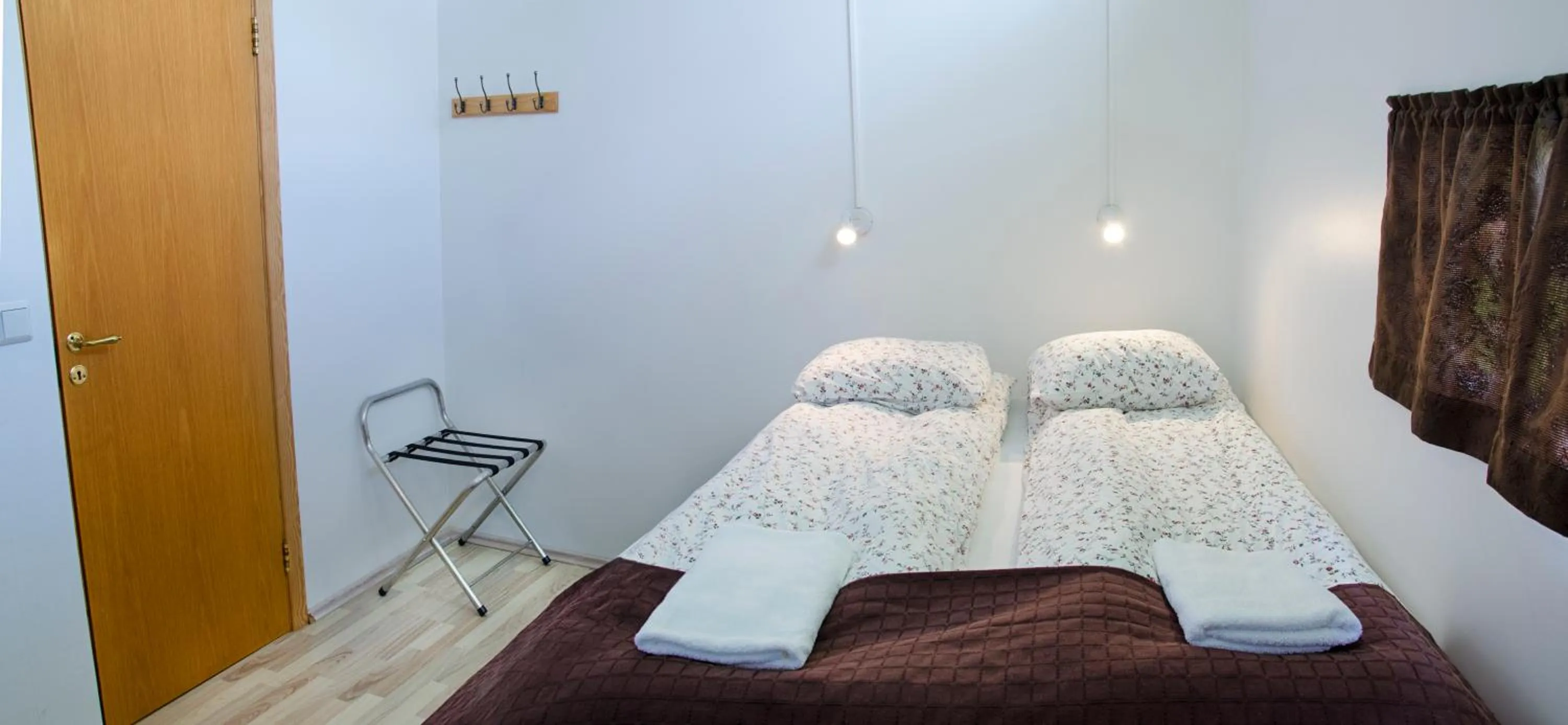 Bed in Hunkubakkar Guesthouse