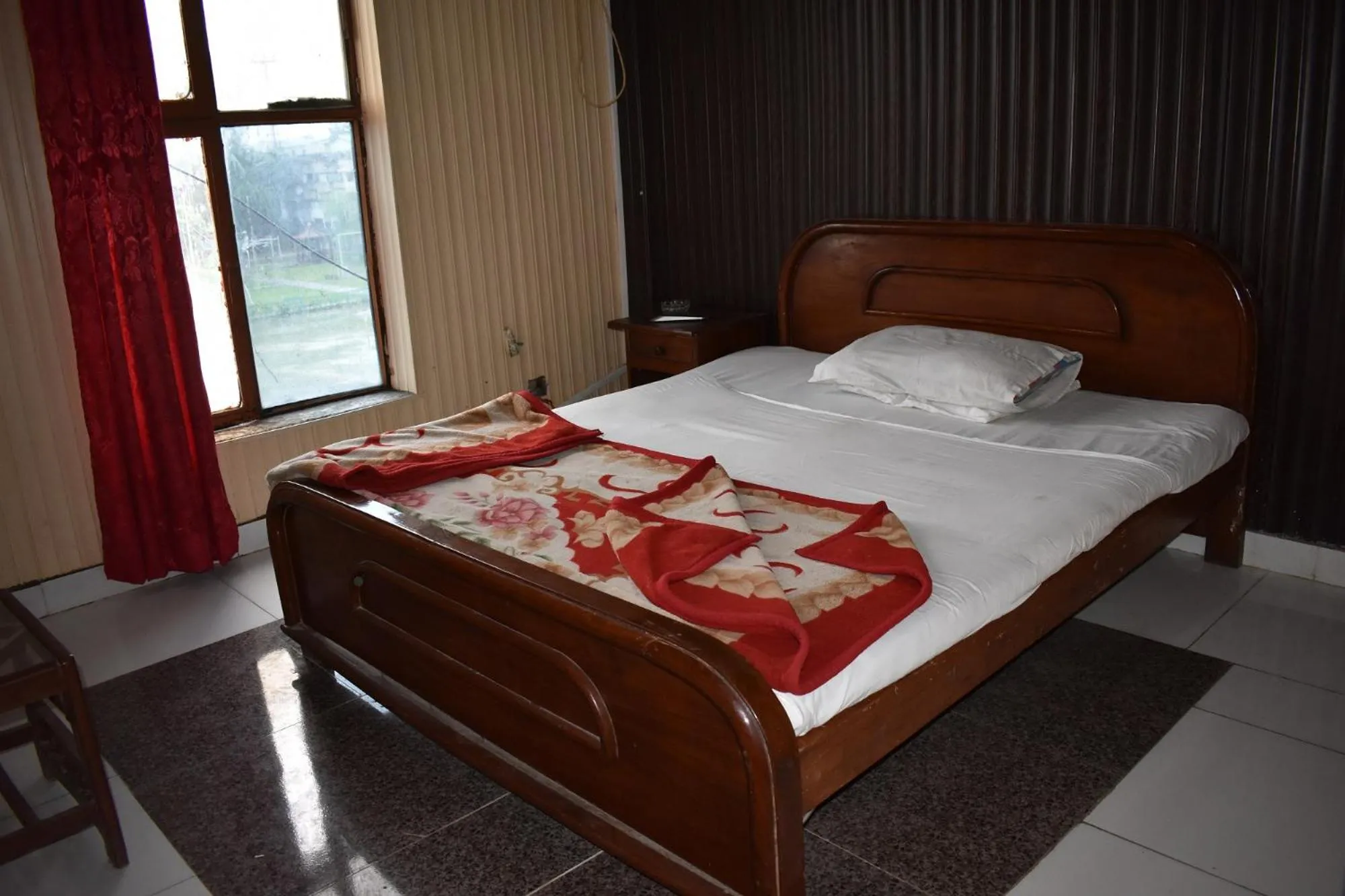 Bed in Sitara Hotel