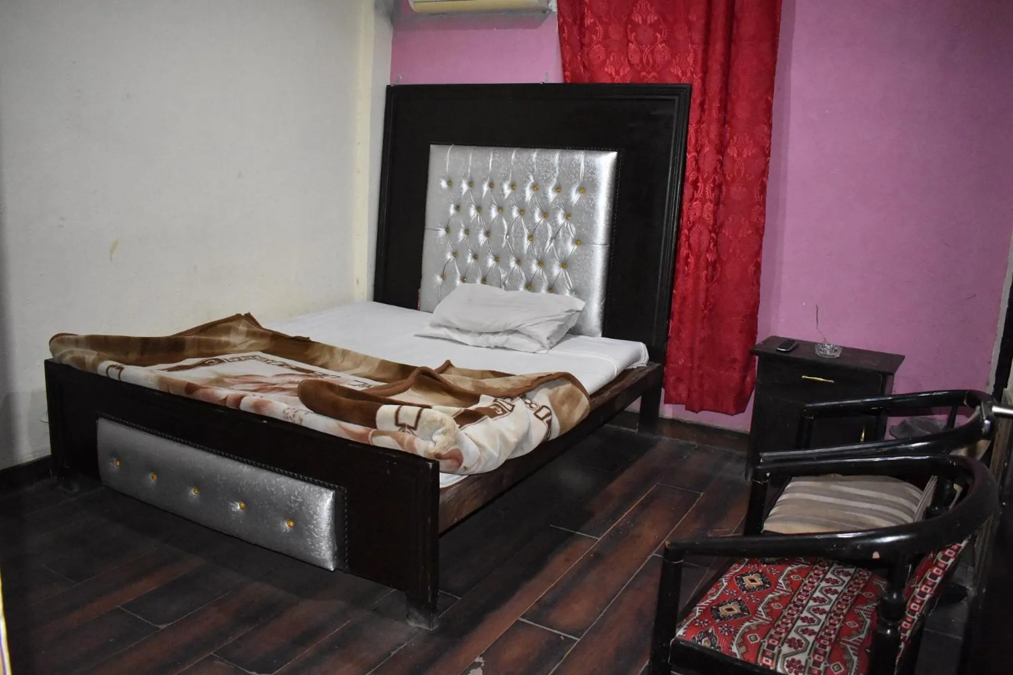 Bed in Sitara Hotel
