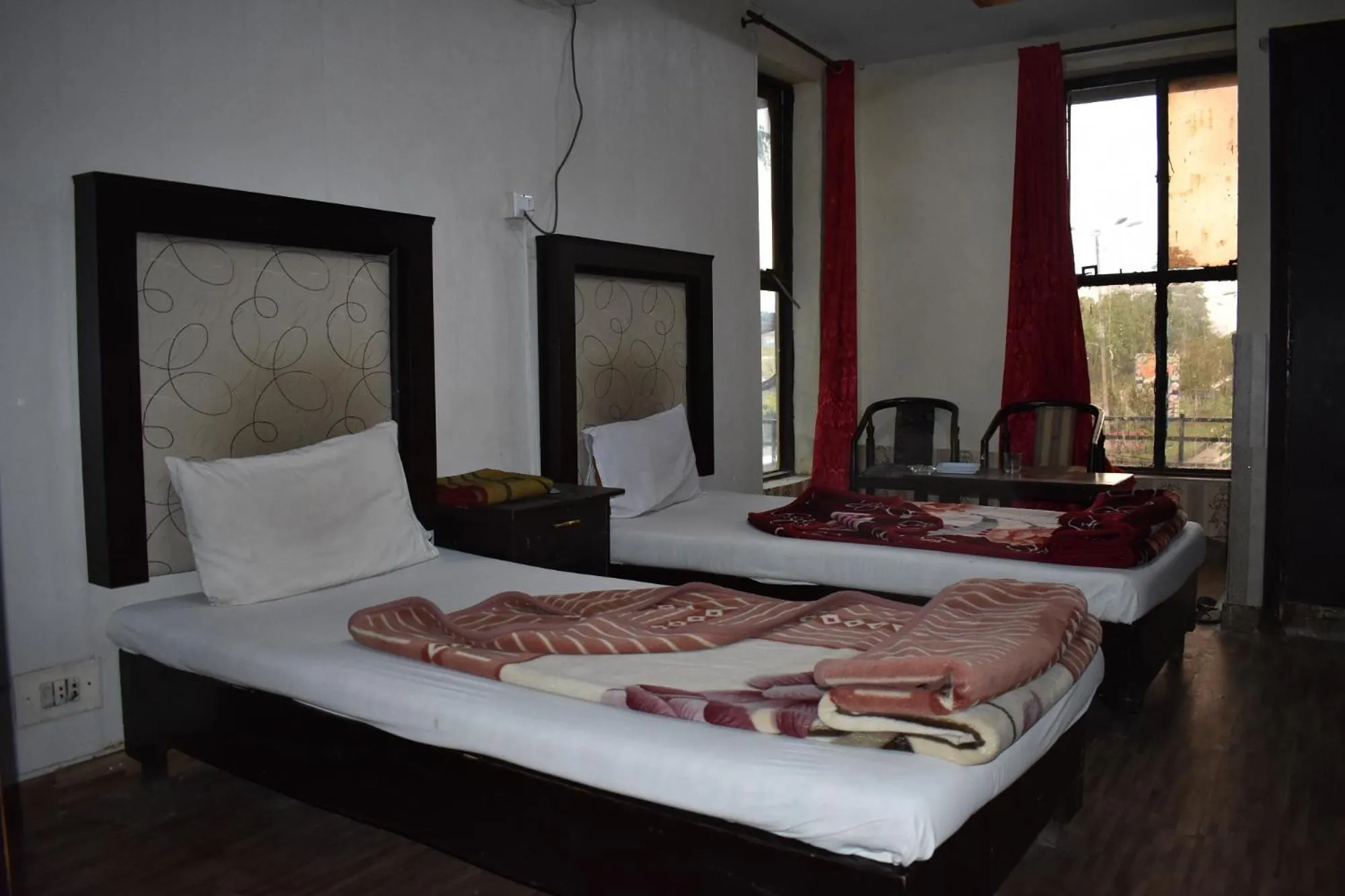 Bed in Sitara Hotel