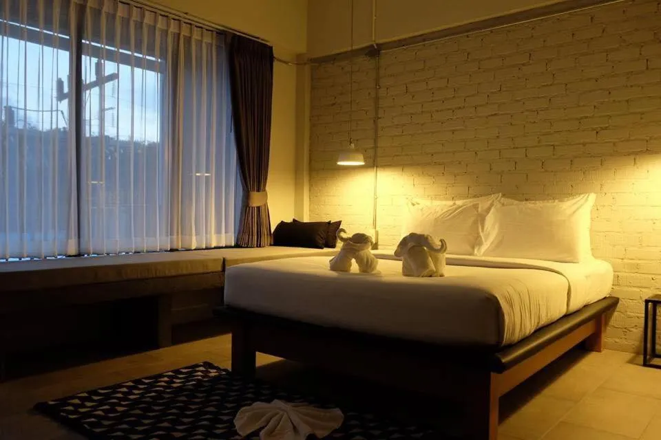 Bed in Palmari Boutique Hotel