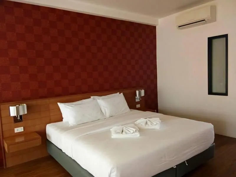 Property building, Bed in Palmari Boutique Hotel