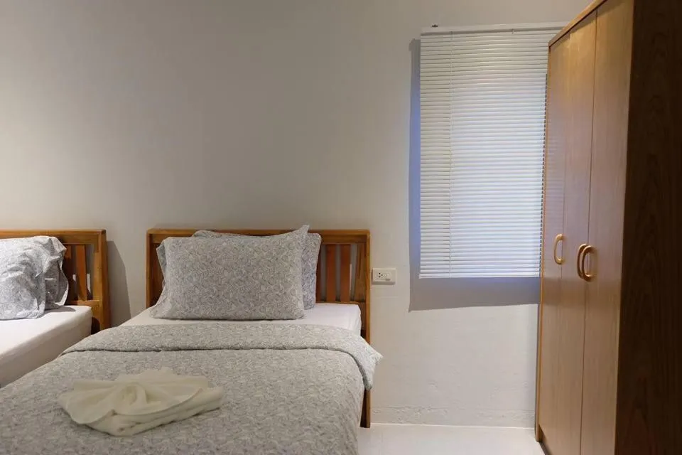 Bed in Palmari Boutique Hotel