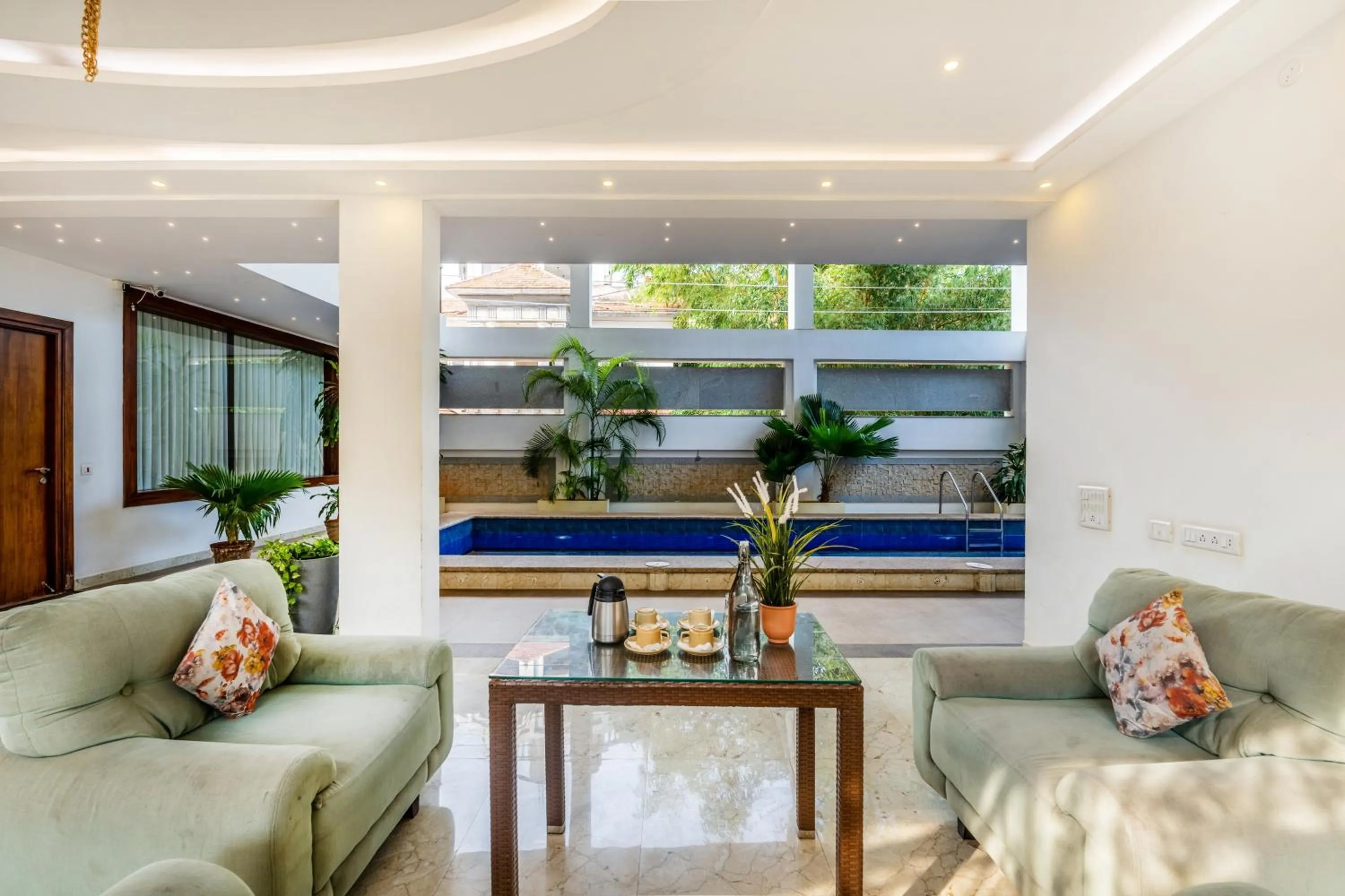 Seating area in Treebo Premium Villa Escape In With Pool View