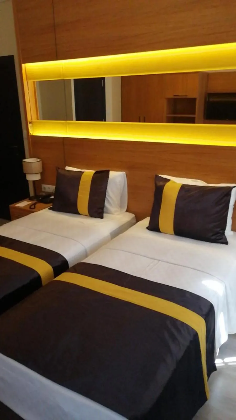Bed in KARAMANS SİRKECİ SUİTES HOTEL