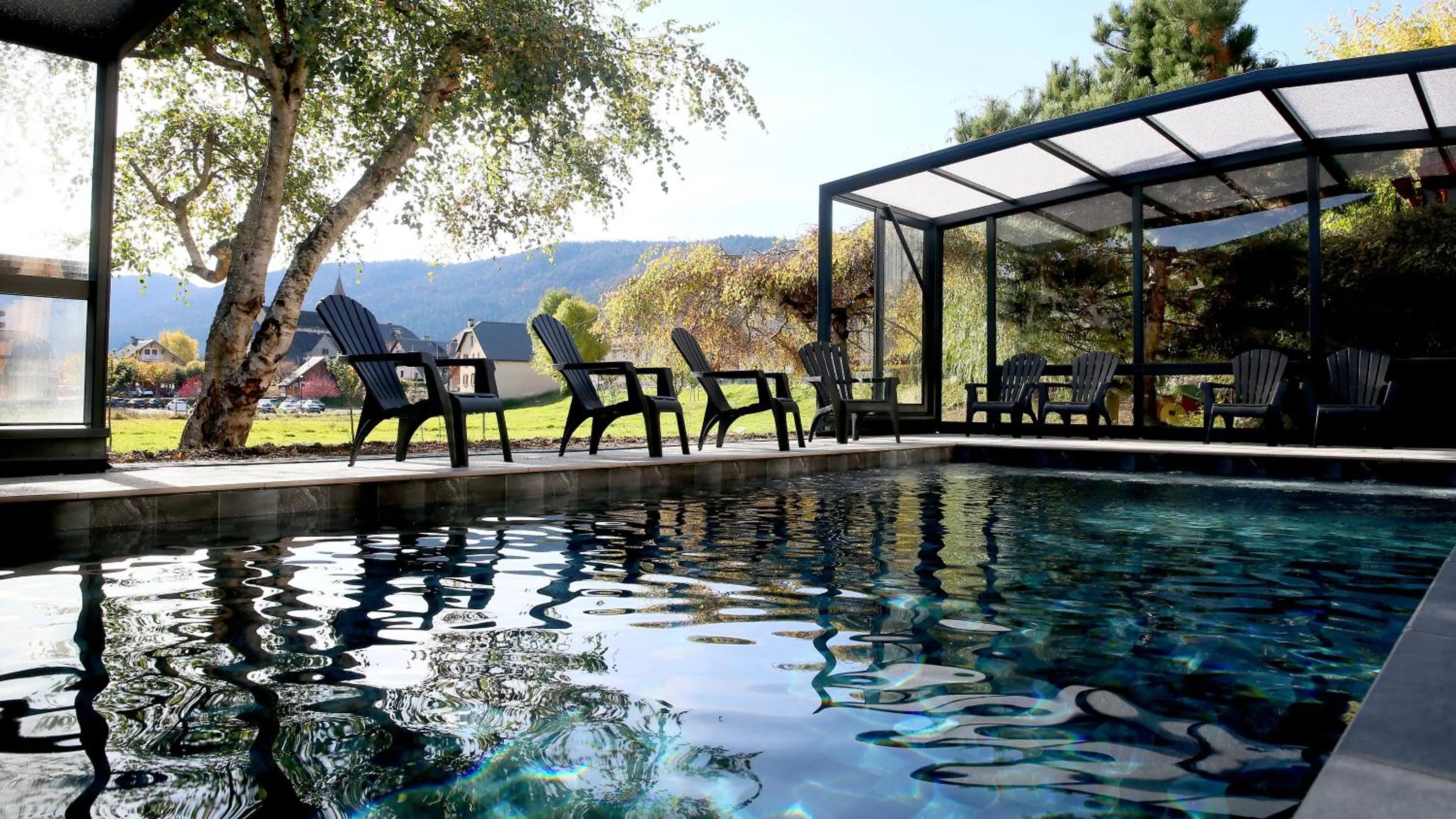 Swimming pool in Hôtel Restaurant La Buffe