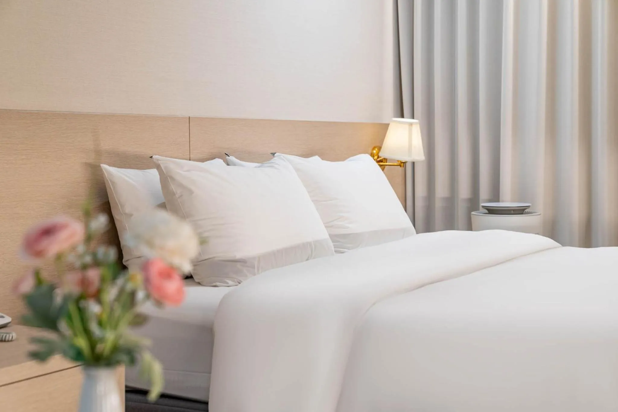 Bed in Benikea Hotel Bizinn