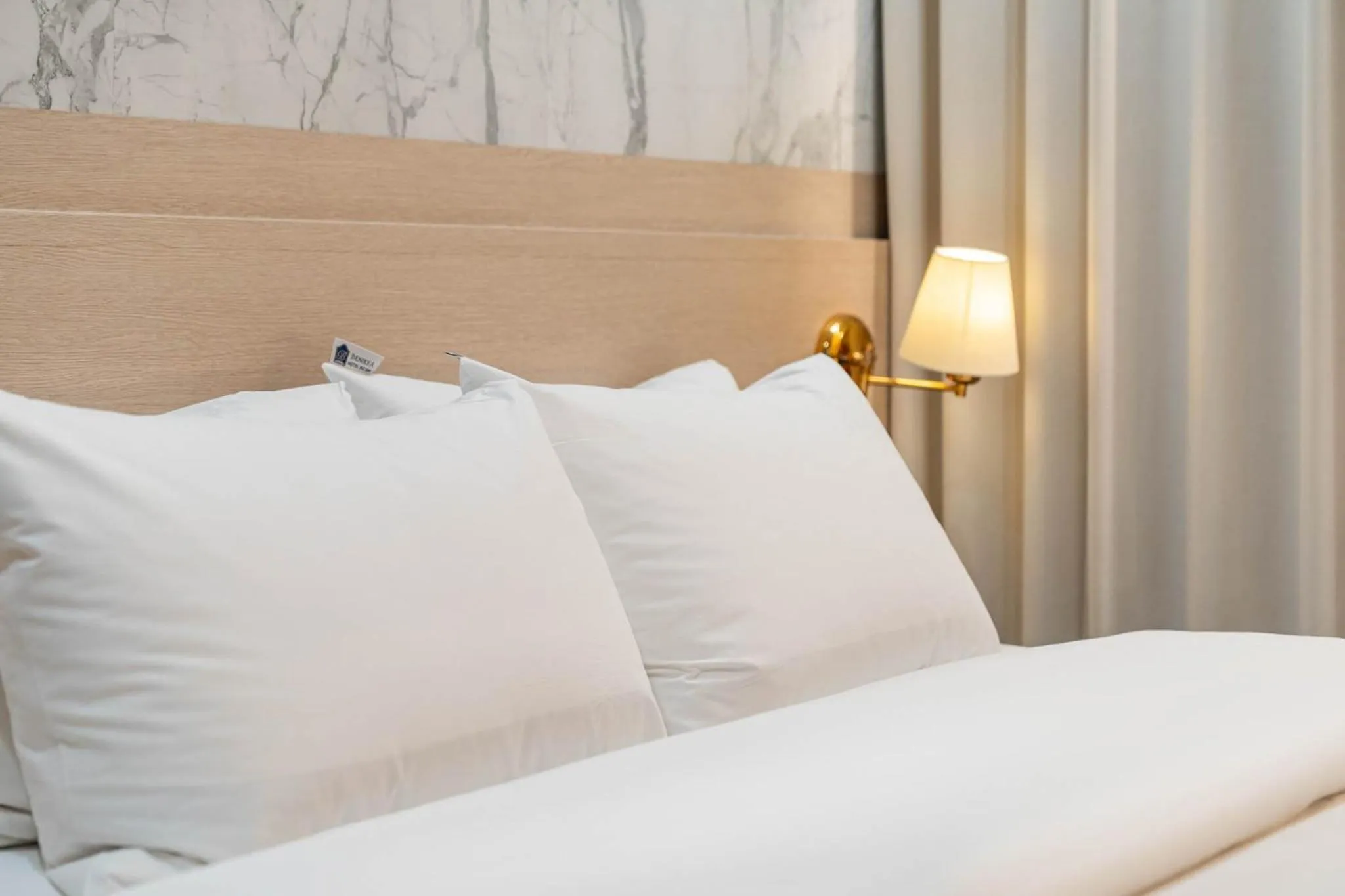 Bed in Benikea Hotel Bizinn