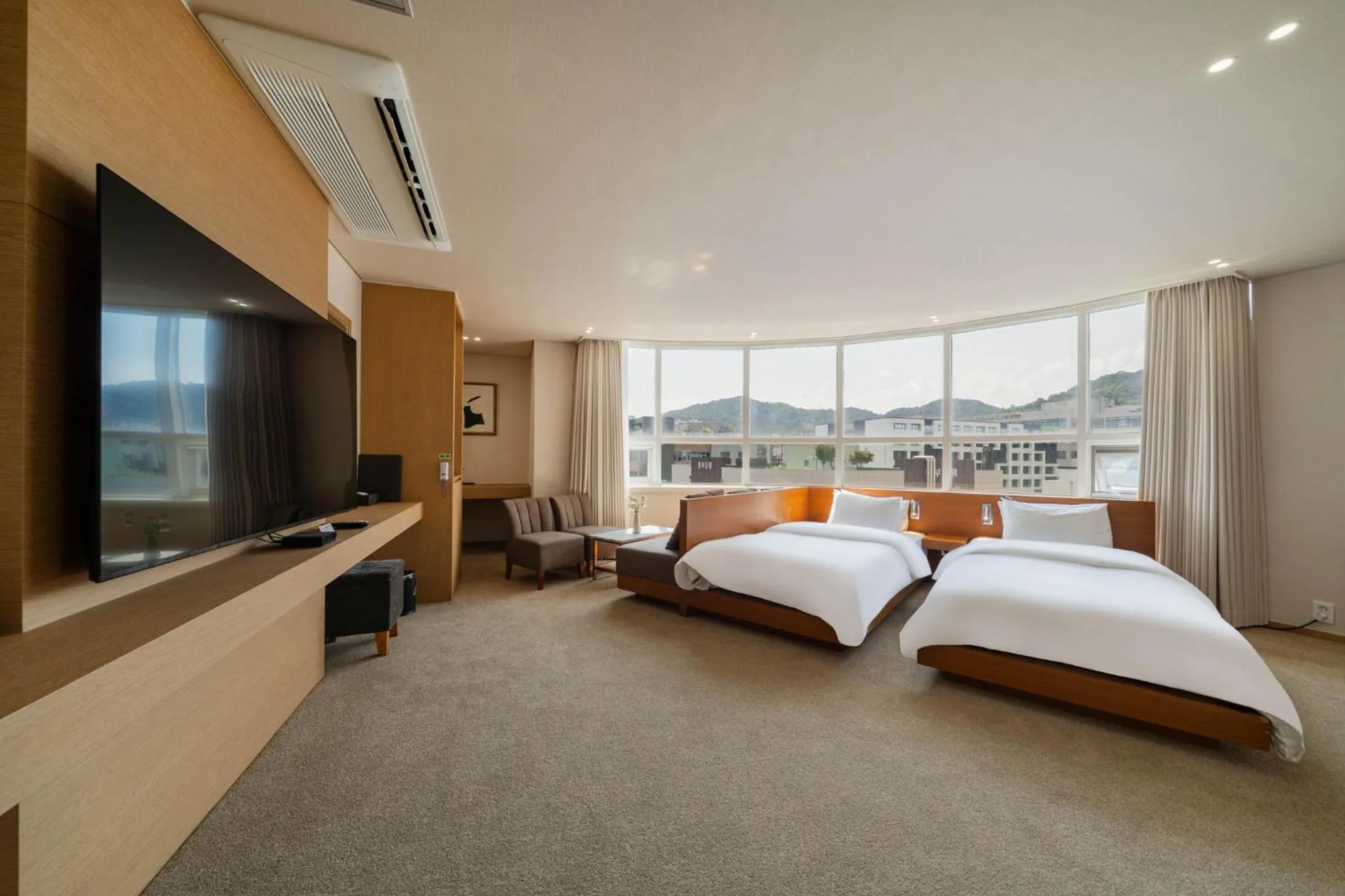 Bed in Benikea Hotel Bizinn