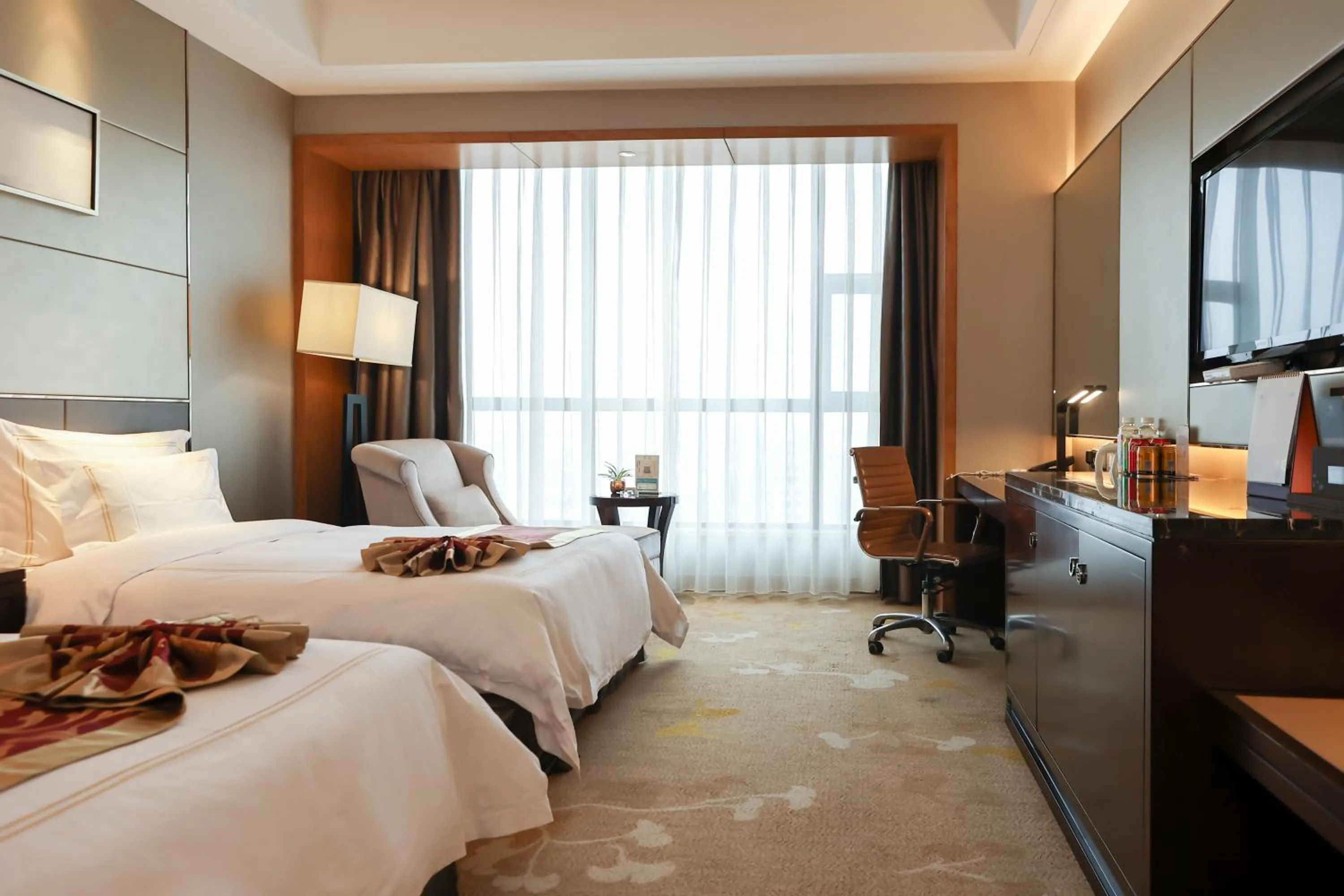 Bed in Tianhong Jinling Grand Hotel