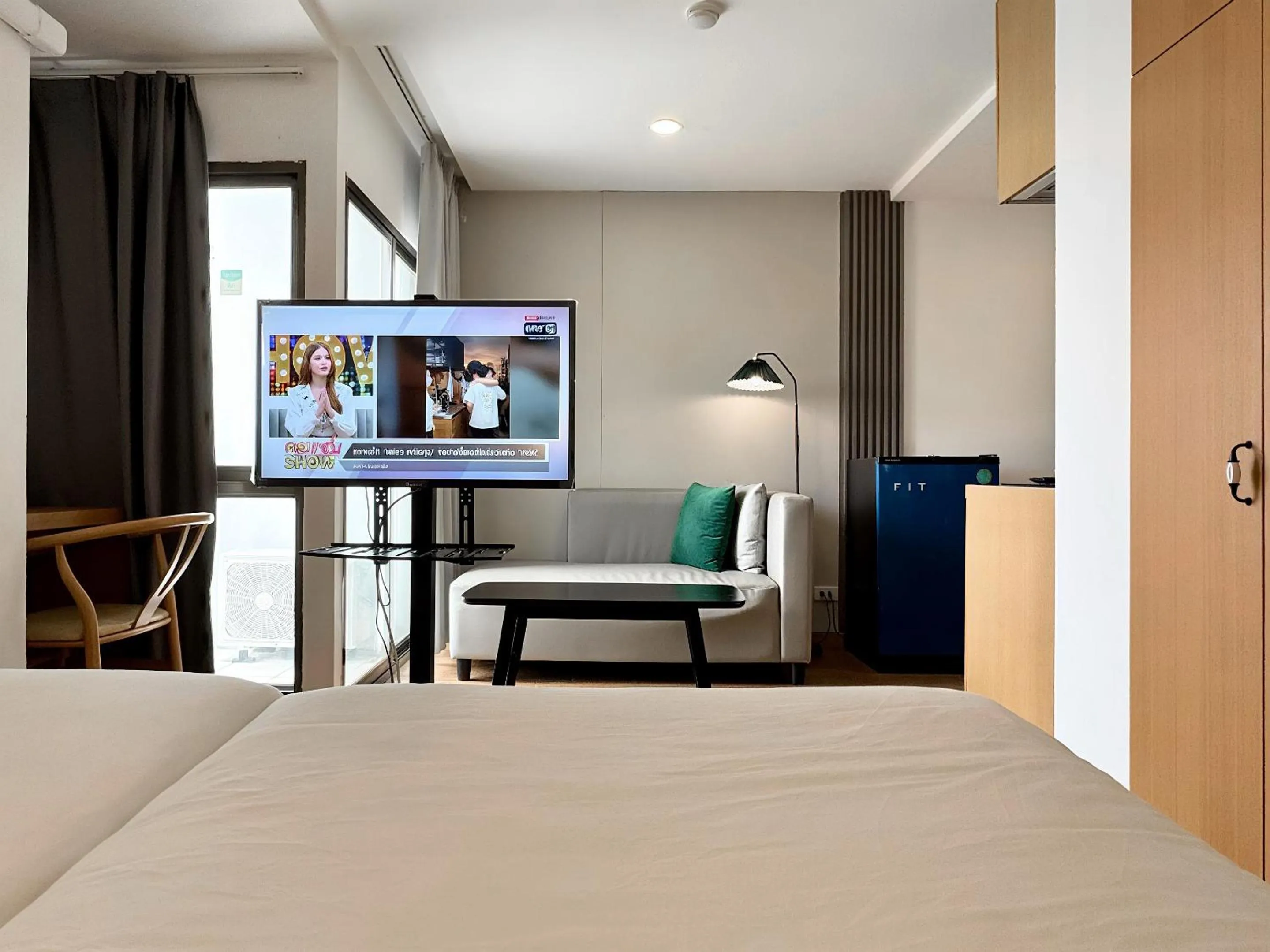 Bed in Pentafield City Residence