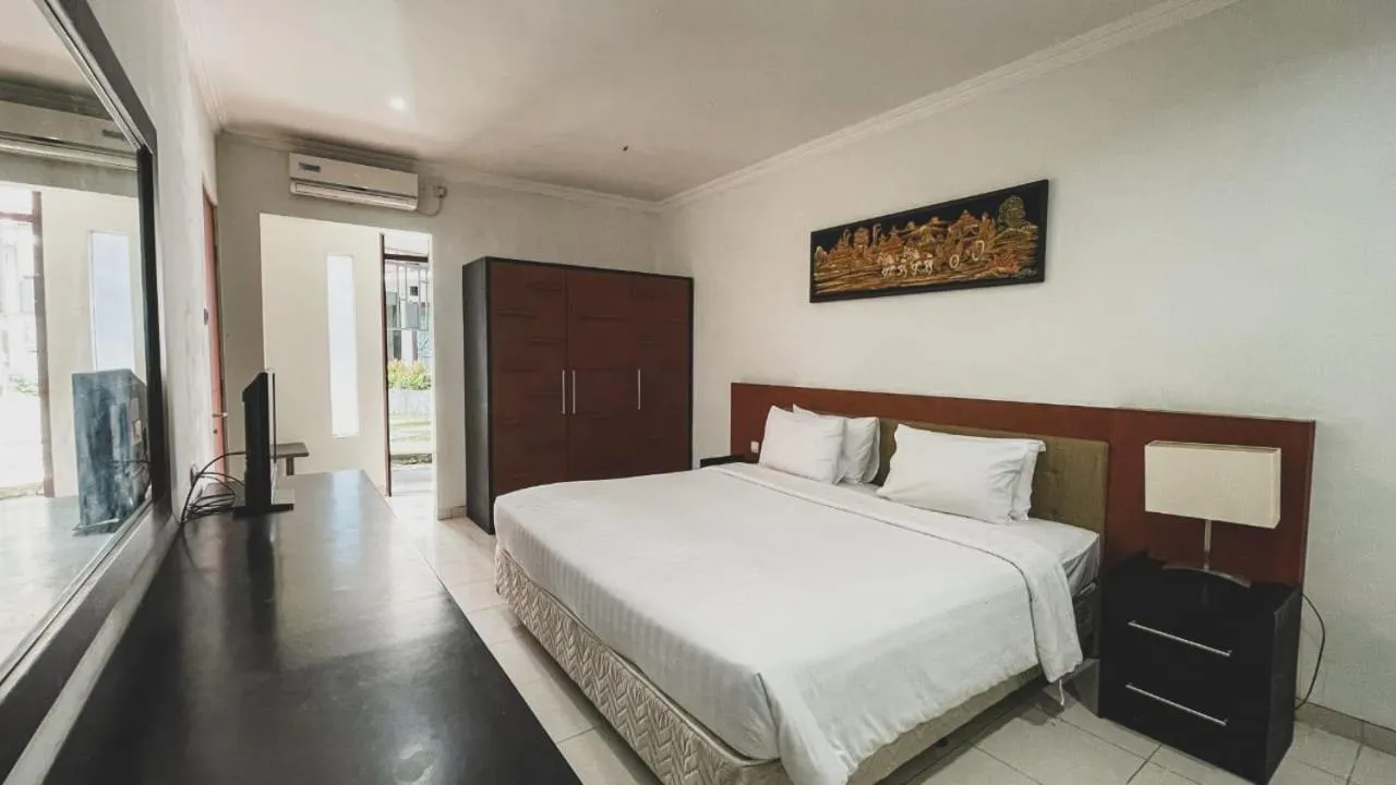 Bed in LPP Garden Hotel